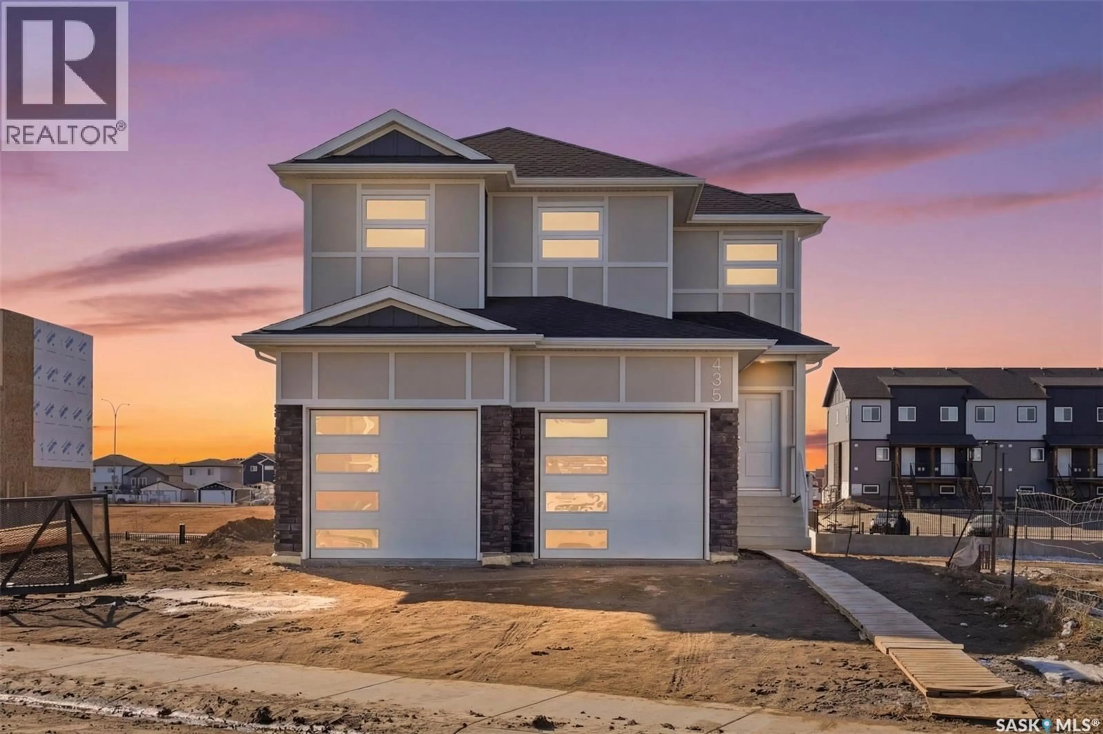 Home with vinyl exterior material, street for 435 SHARMA CRESCENT, Saskatoon Saskatchewan S7W0Y4