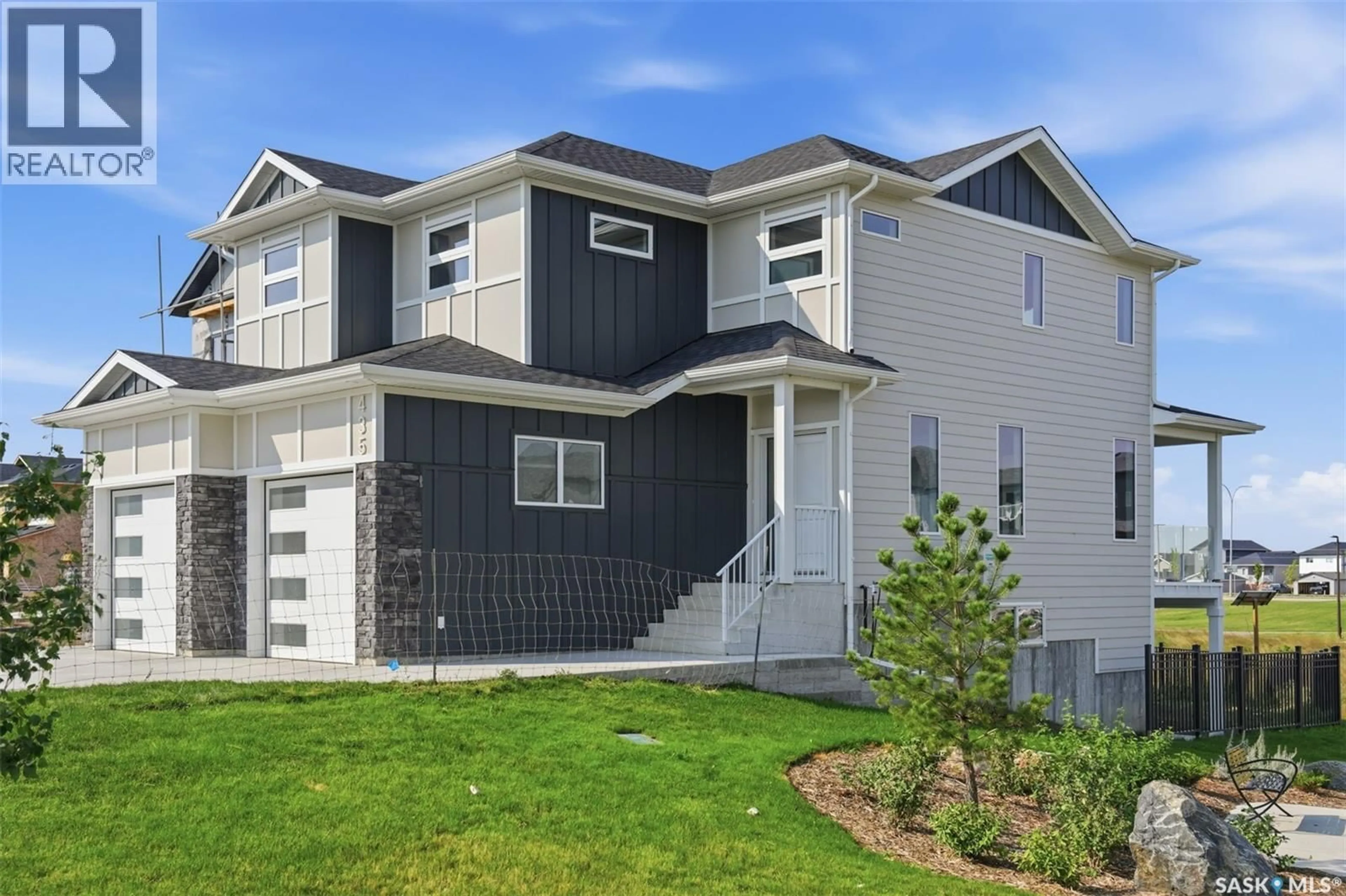 Home with vinyl exterior material, street for 435 SHARMA CRESCENT, Saskatoon Saskatchewan S7W0Y4
