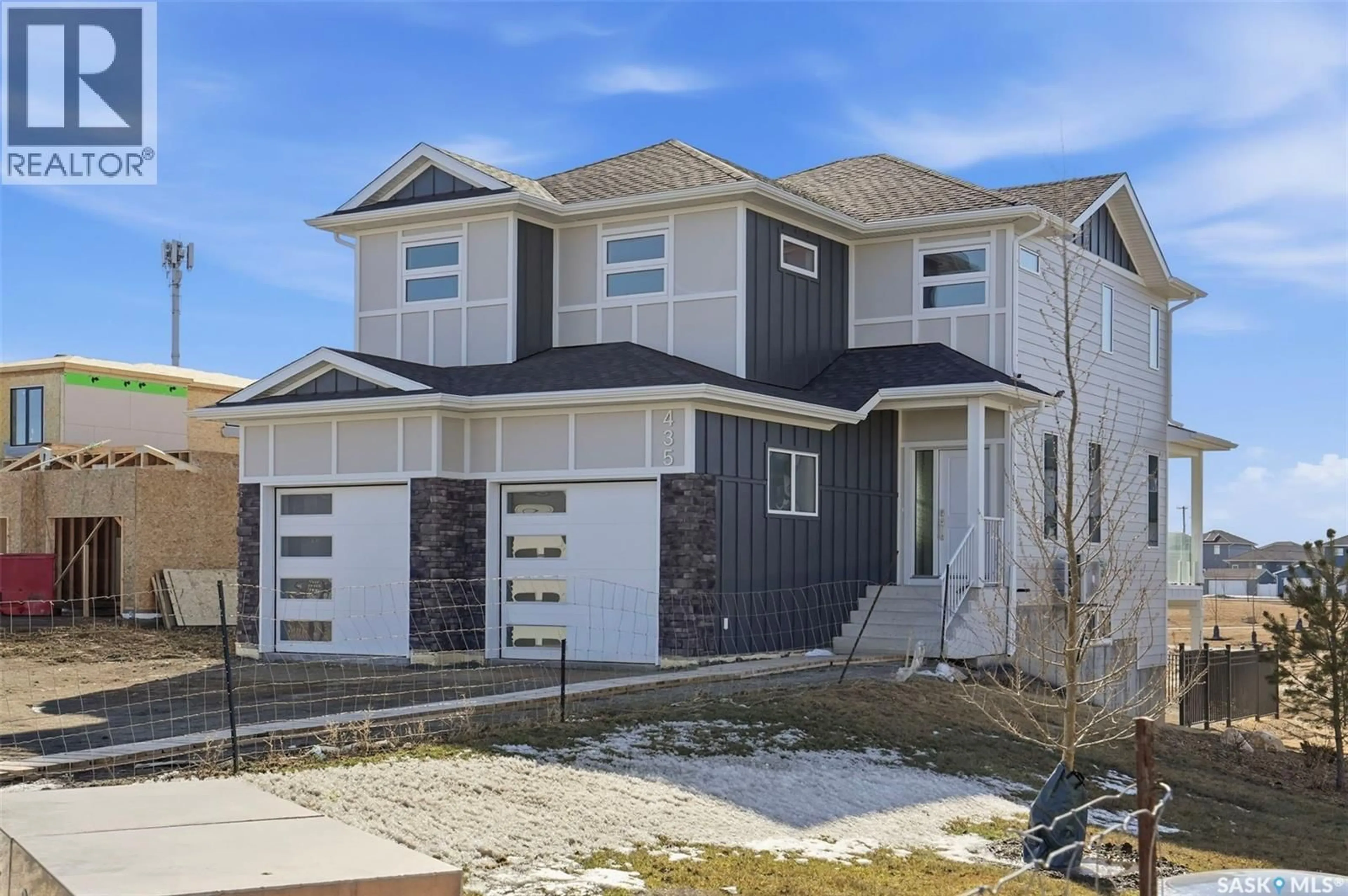 Home with vinyl exterior material, street for 435 SHARMA CRESCENT, Saskatoon Saskatchewan S7W0Y4