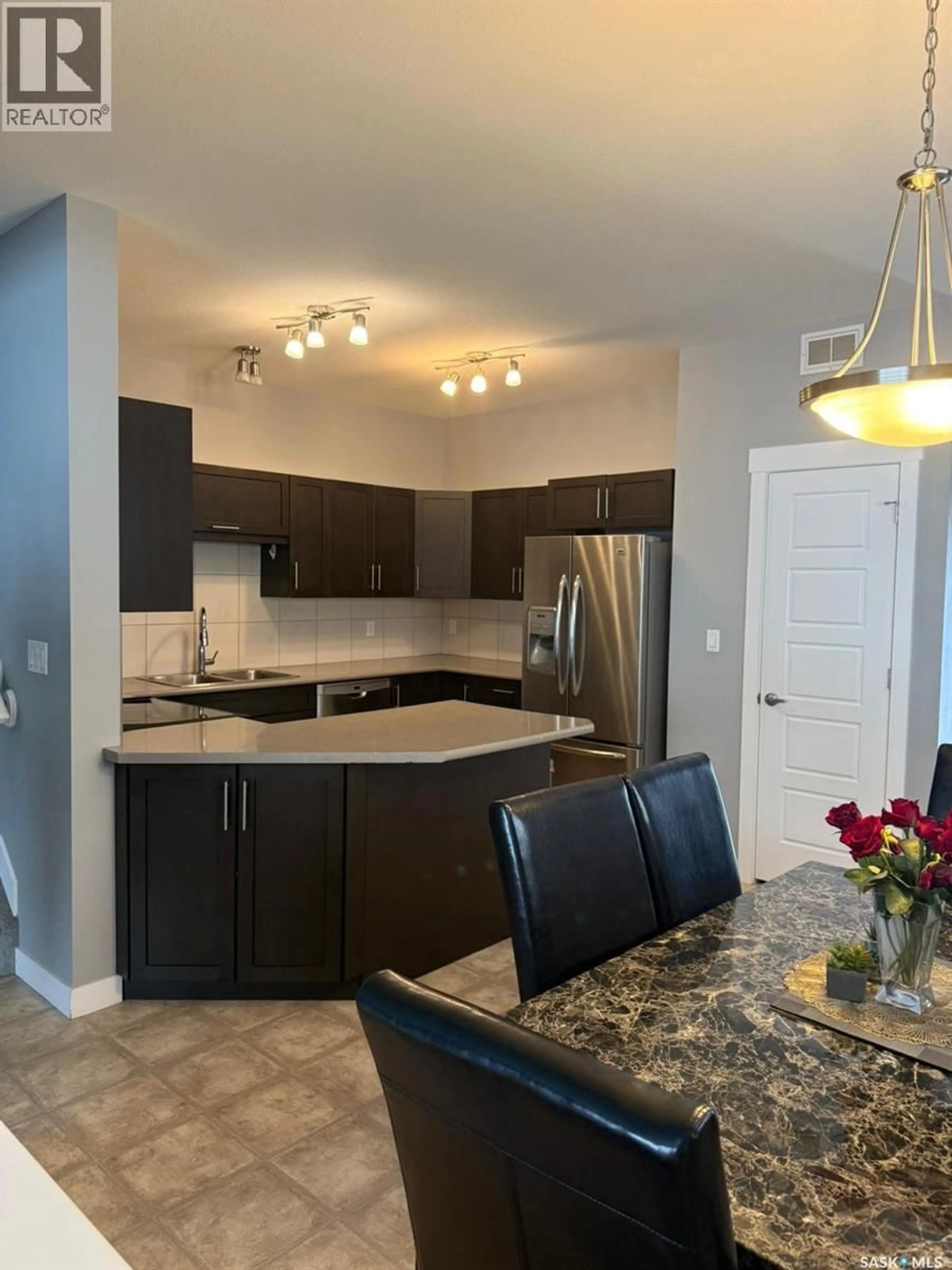 Open concept kitchen, ceramic/tile floor for E - 4609 GREEN ROCK ROAD, Regina Saskatchewan S4V3K8