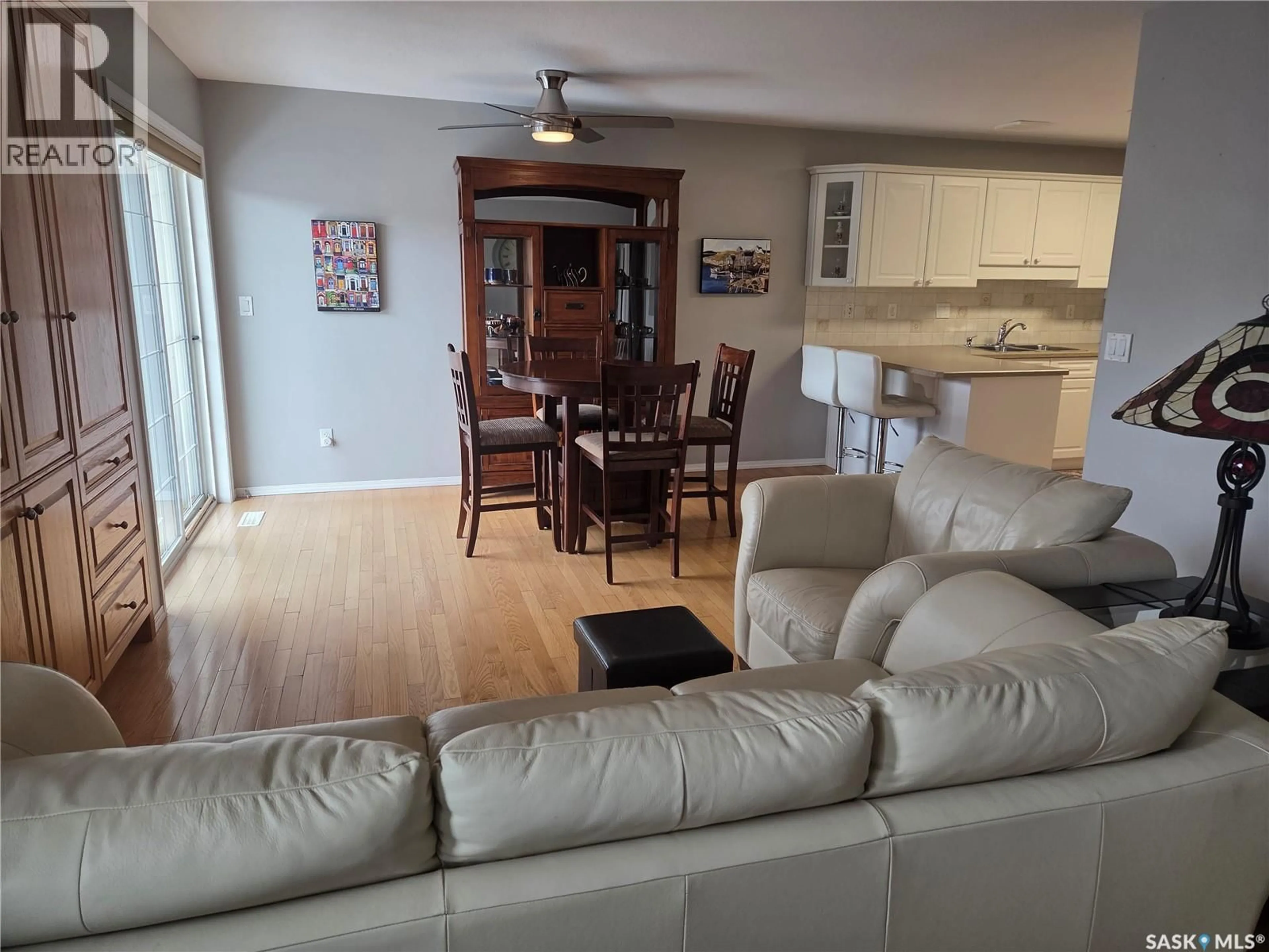 Living room with furniture, unknown for 102A 425 KEEVIL CRESCENT, Saskatoon Saskatchewan S7N4R9