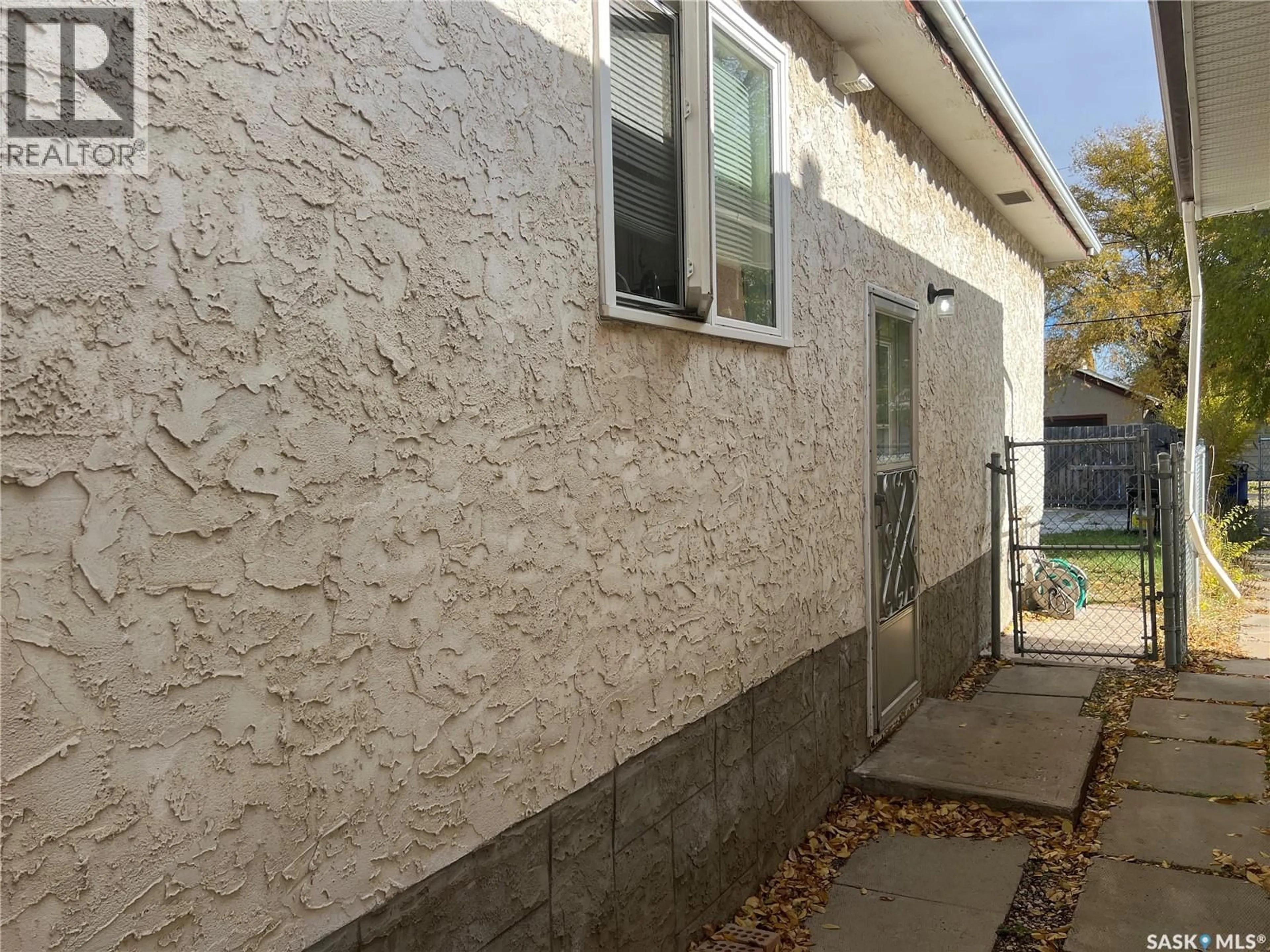 Home with vinyl exterior material, street for 405 YORK STREET, Regina Saskatchewan S4R4W7