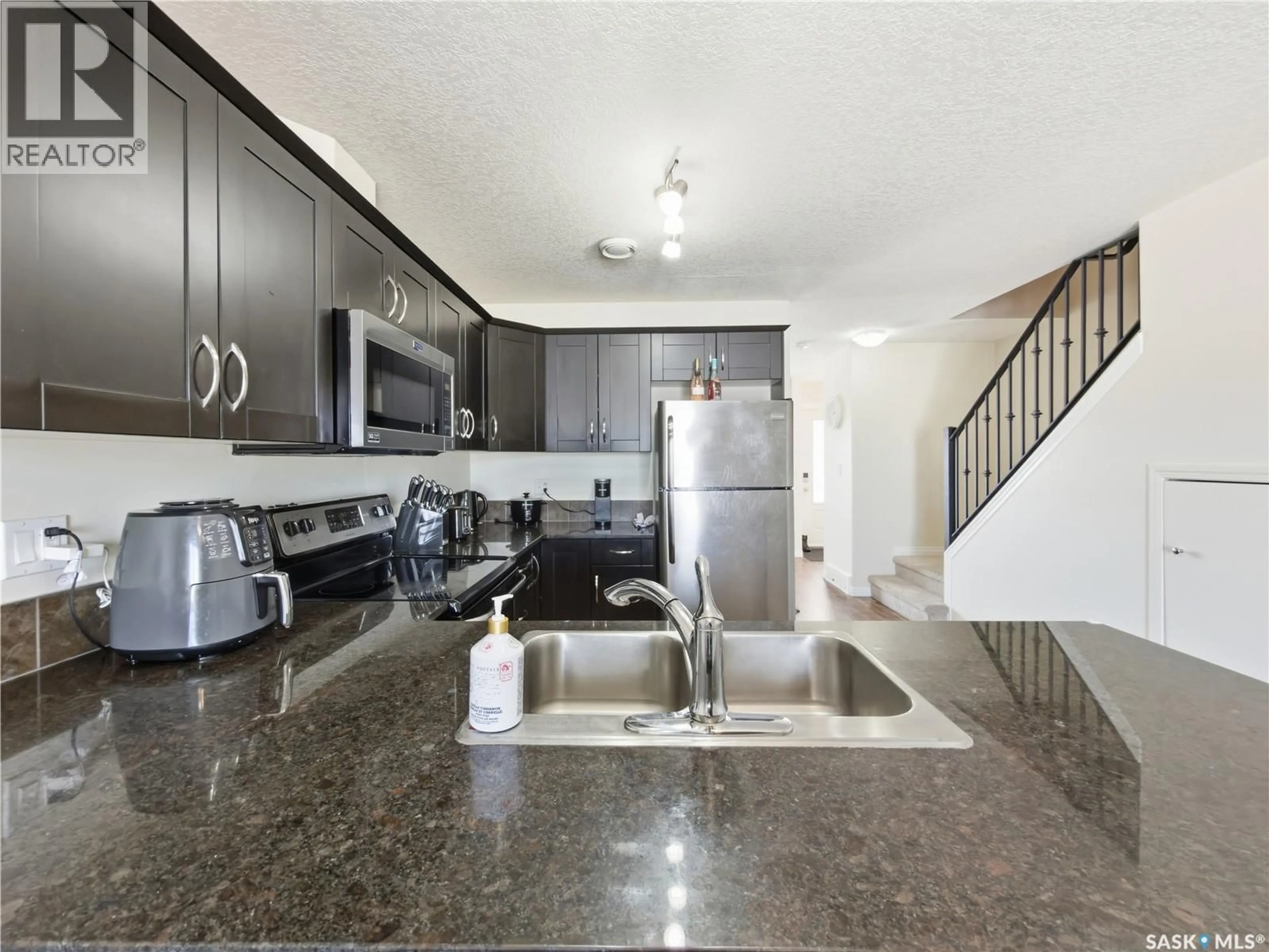 Open concept kitchen, unknown for 209 - 3818 DEWDNEY AVENUE, Regina Saskatchewan S4Z0A6