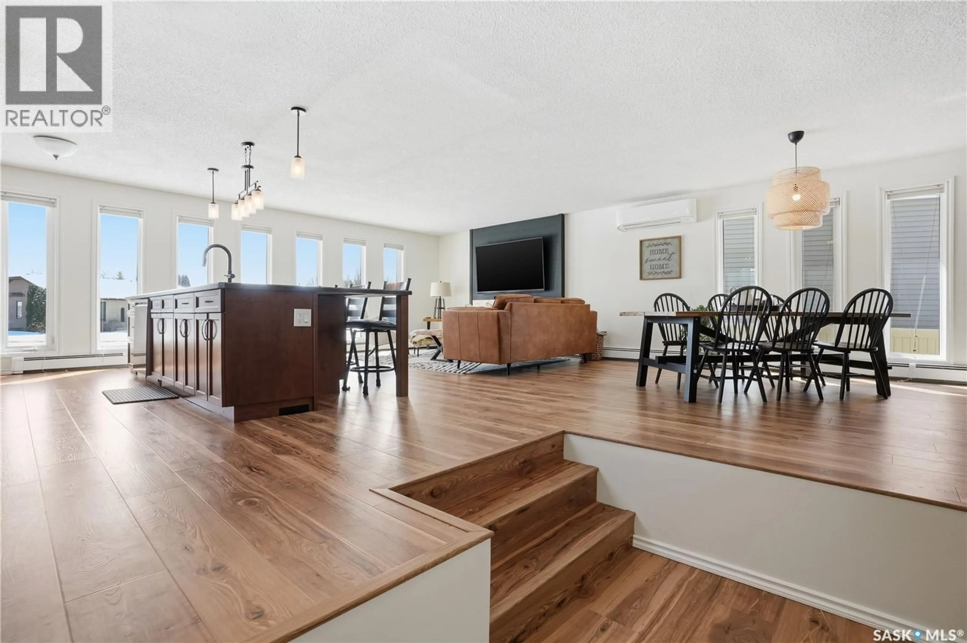 Open concept kitchen, wood/laminate floor for 1643 GENERAL CRESCENT, Moose Jaw Saskatchewan S6H6M2