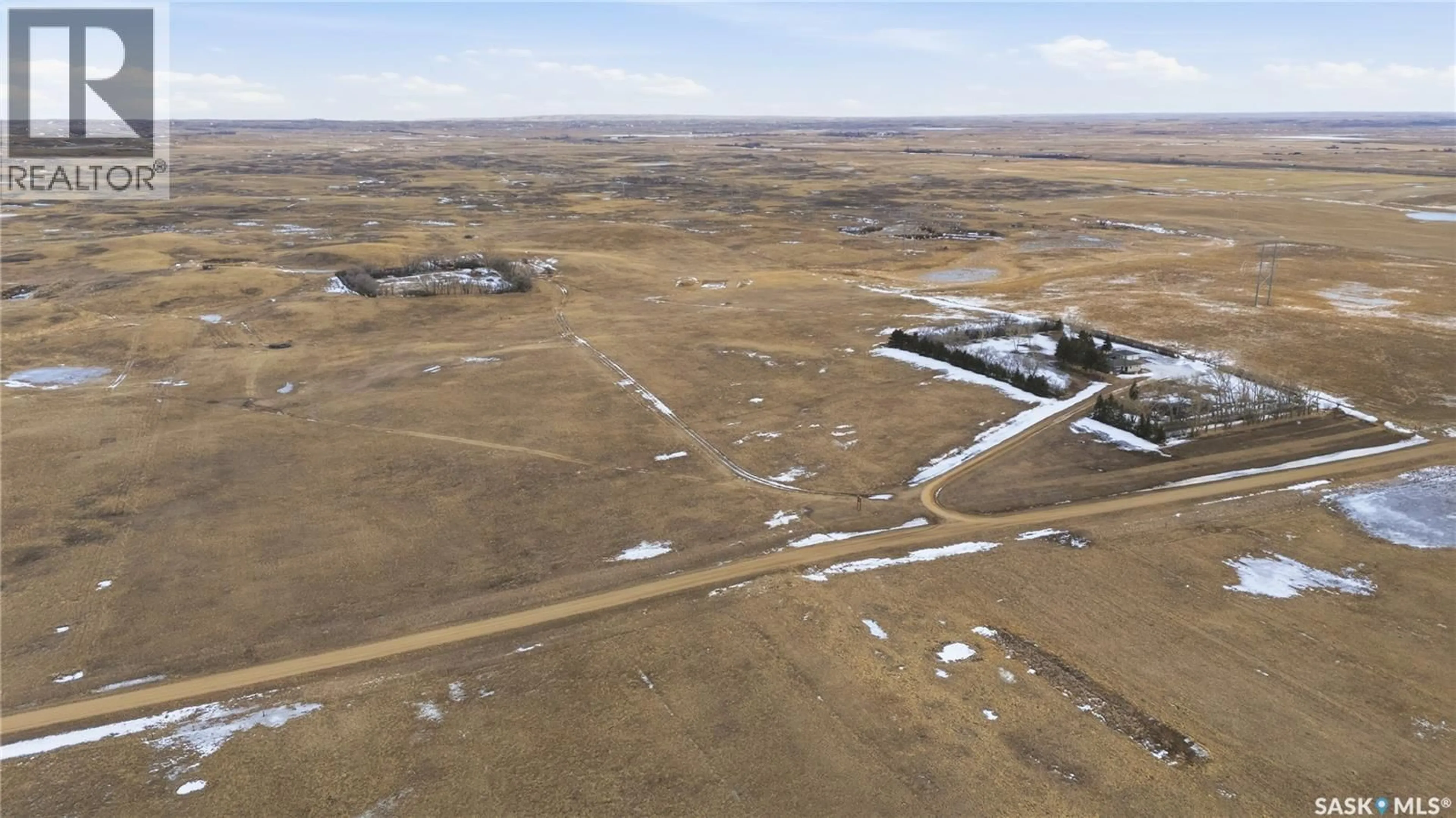 A pic from outside/outdoor area/front of a property/back of a property/a pic from drone, street for HALLBORG ACREAGE, Chaplin Rm No. 164 Saskatchewan S0H0V0