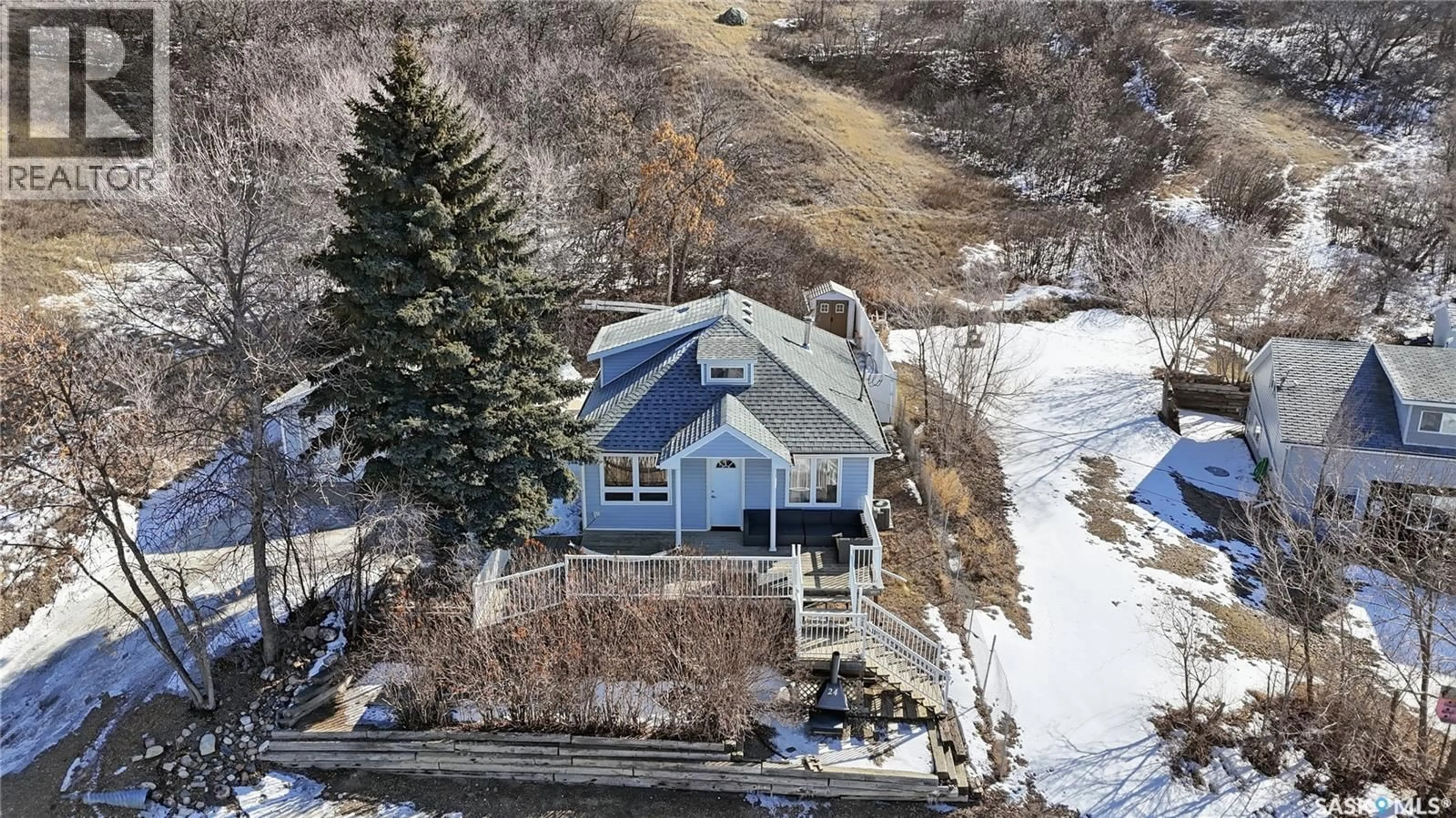 A pic from outside/outdoor area/front of a property/back of a property/a pic from drone, water/lake/river/ocean view for 24 ALICE CRESCENT, Marquis Rm No. 191 Saskatchewan S0H4C0