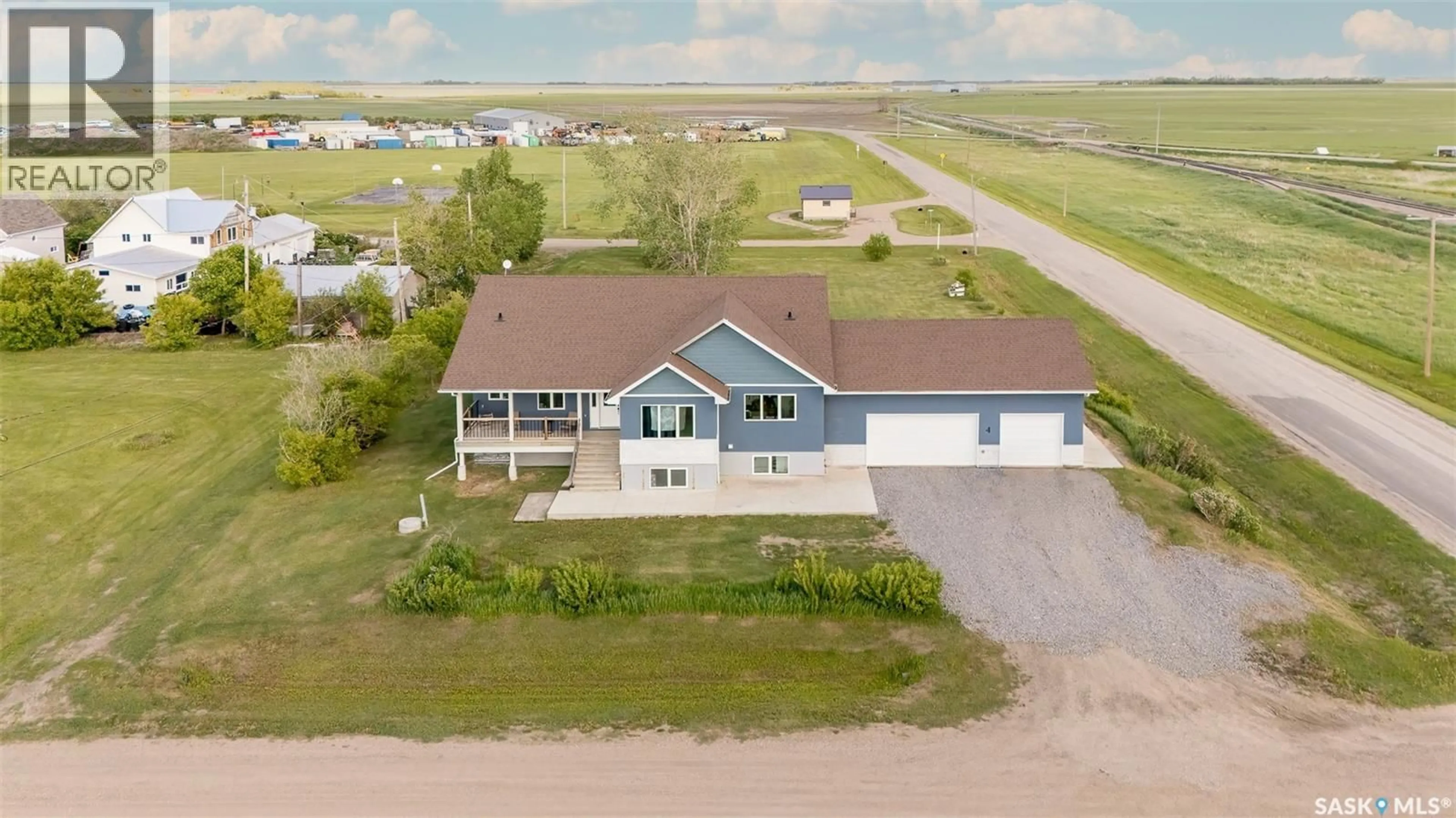 A pic from outside/outdoor area/front of a property/back of a property/a pic from drone, water/lake/river/ocean view for 1 BROWNLEE STREET, Tuxford Saskatchewan S0H4C0