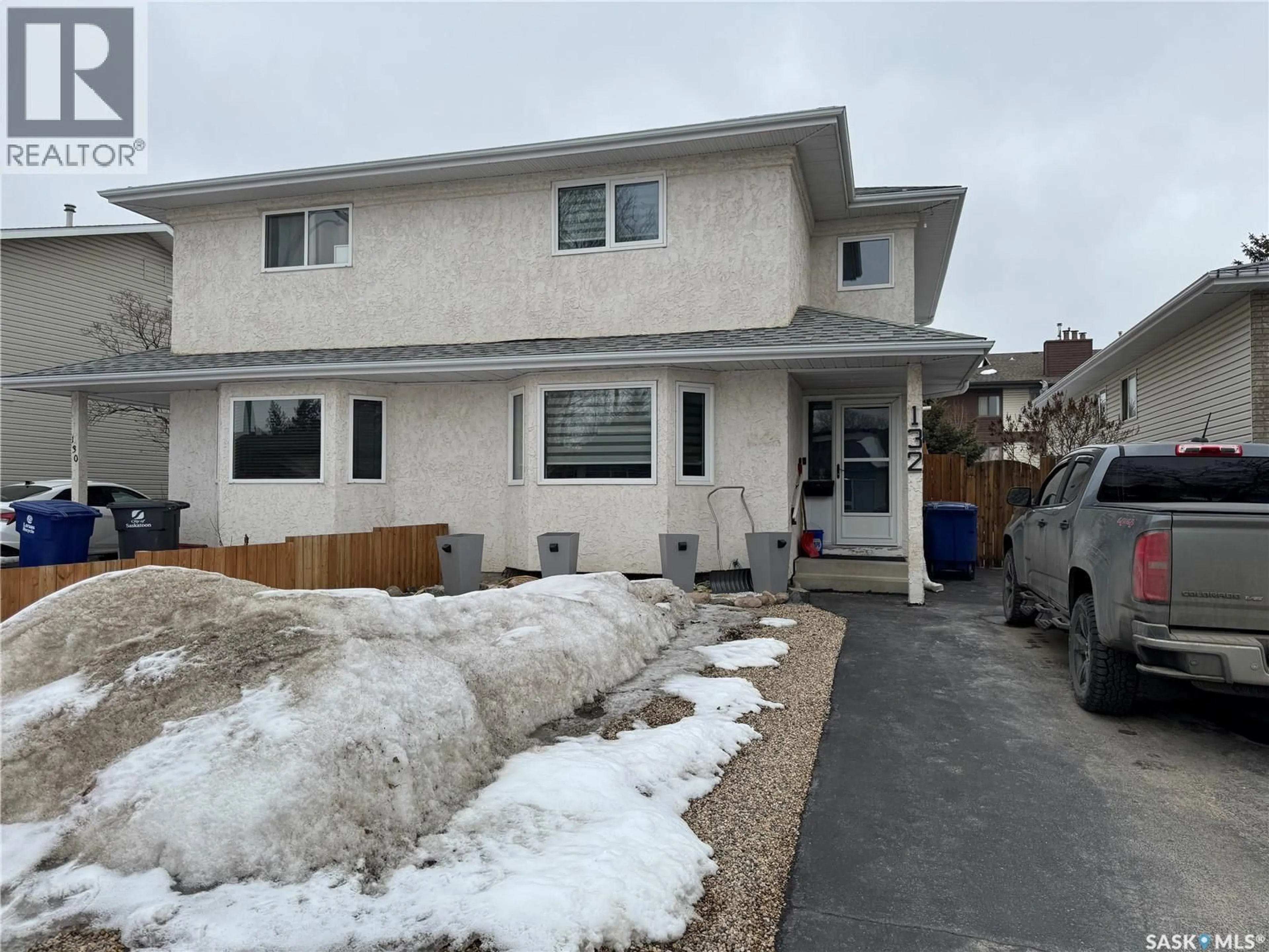 Home with vinyl exterior material, street for 132 BARBER CRESCENT, Saskatoon Saskatchewan S7M5M7