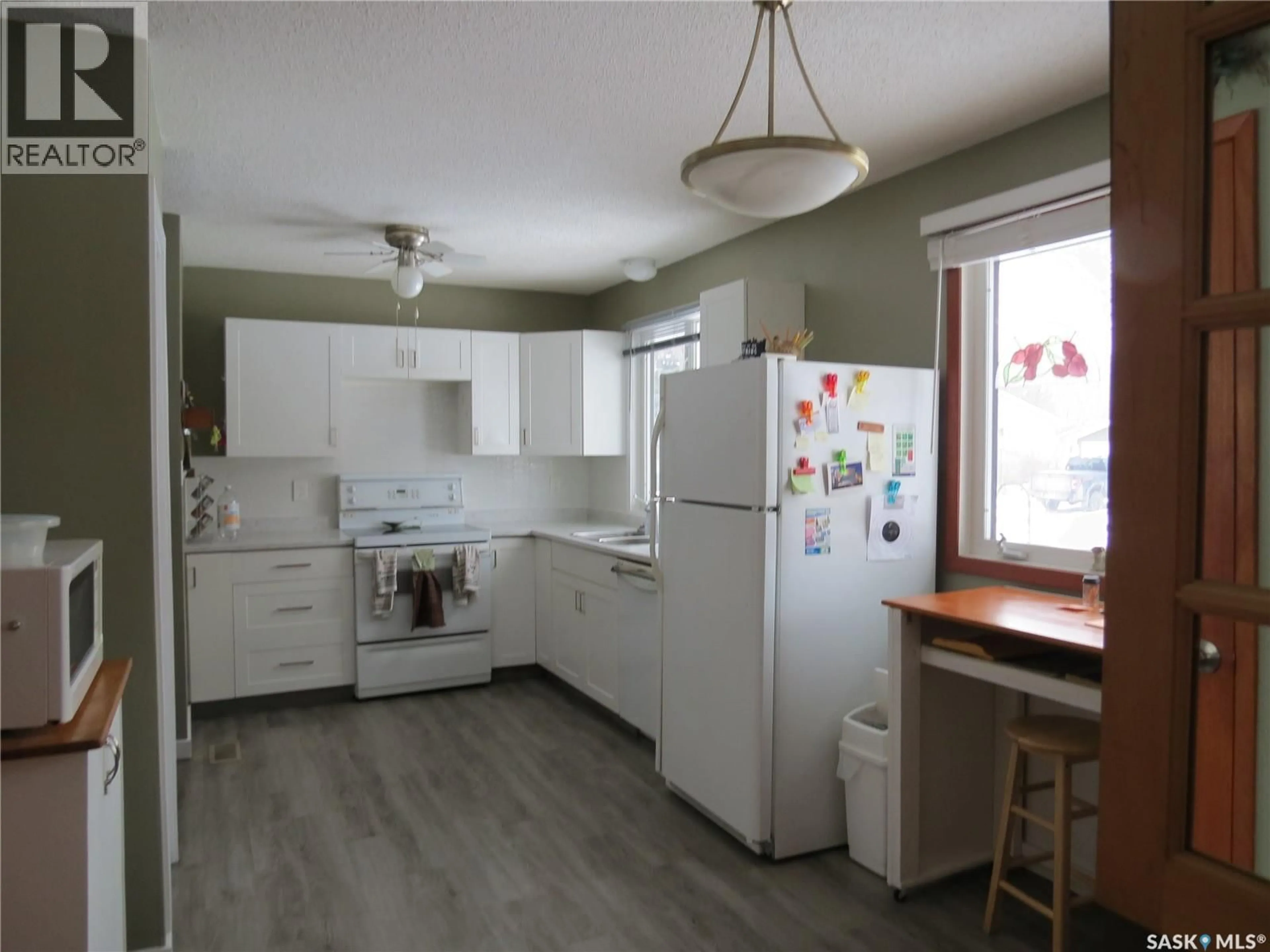 Standard kitchen, wood/laminate floor for 30 CLELAND STREET, Regina Saskatchewan S4R4G2