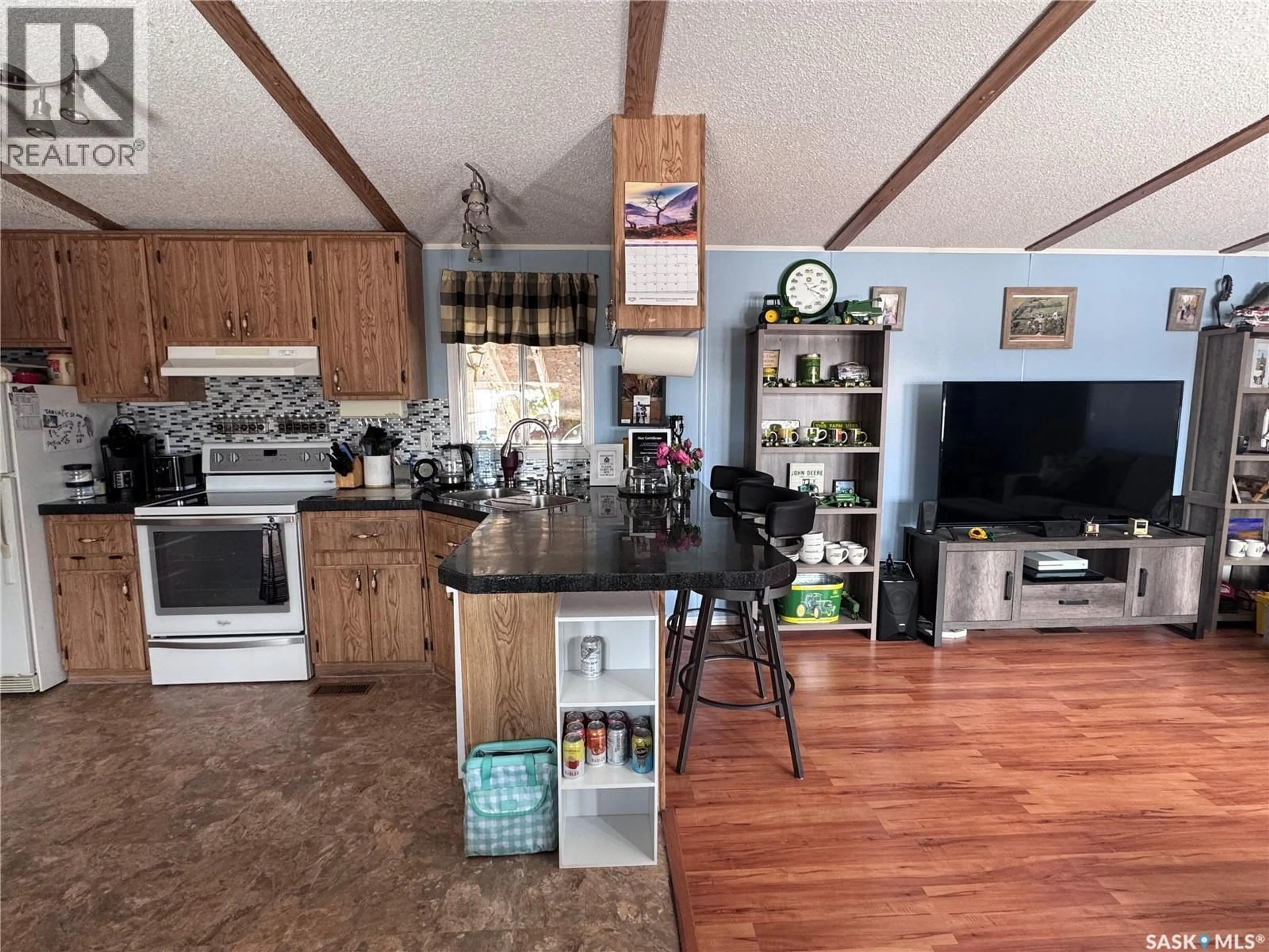 Open concept kitchen, unknown for 1111 RIESE DRIVE, La Ronge Saskatchewan S0J1L0