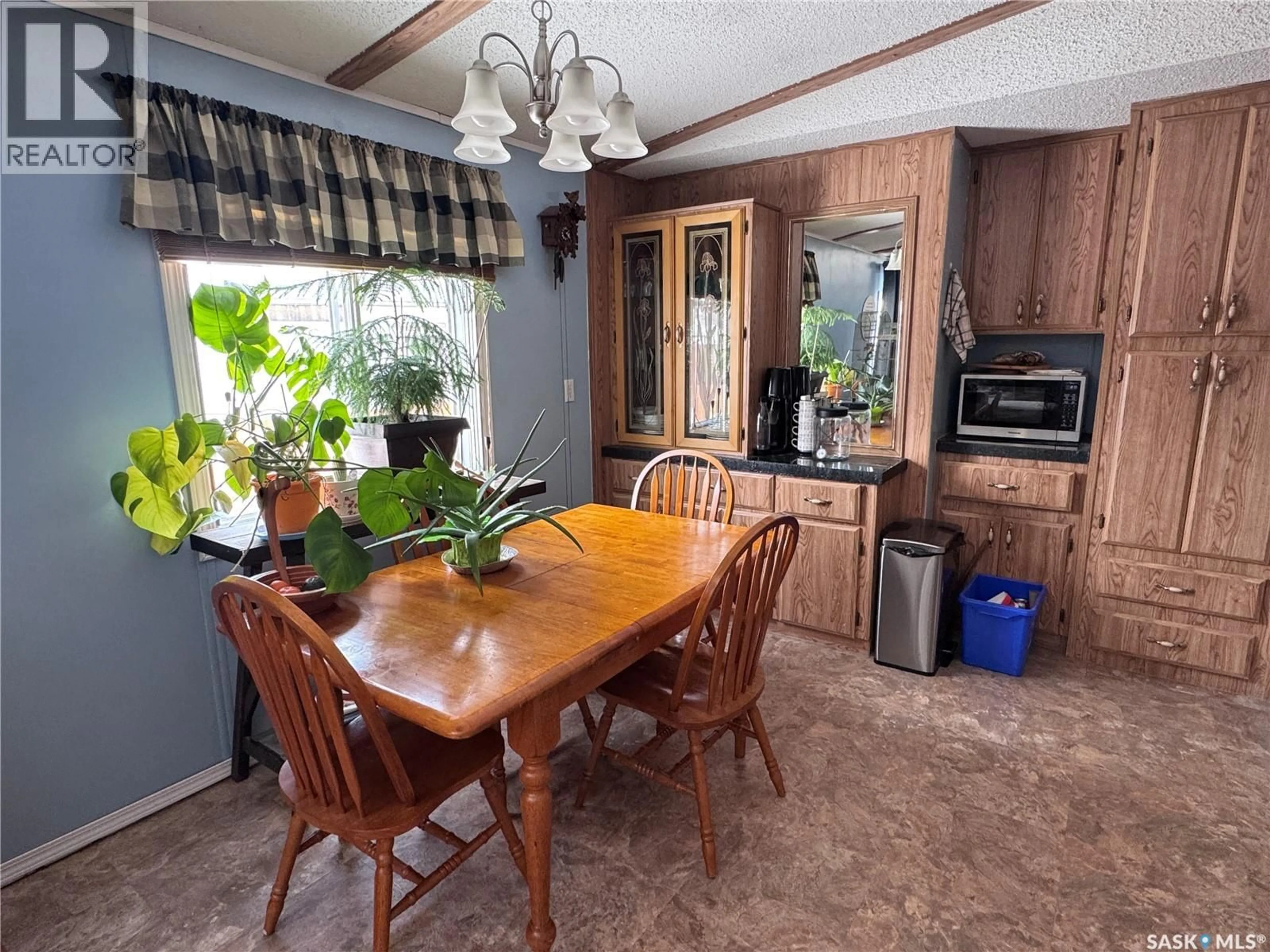 Dining room, wood/laminate floor for 1111 RIESE DRIVE, La Ronge Saskatchewan S0J1L0