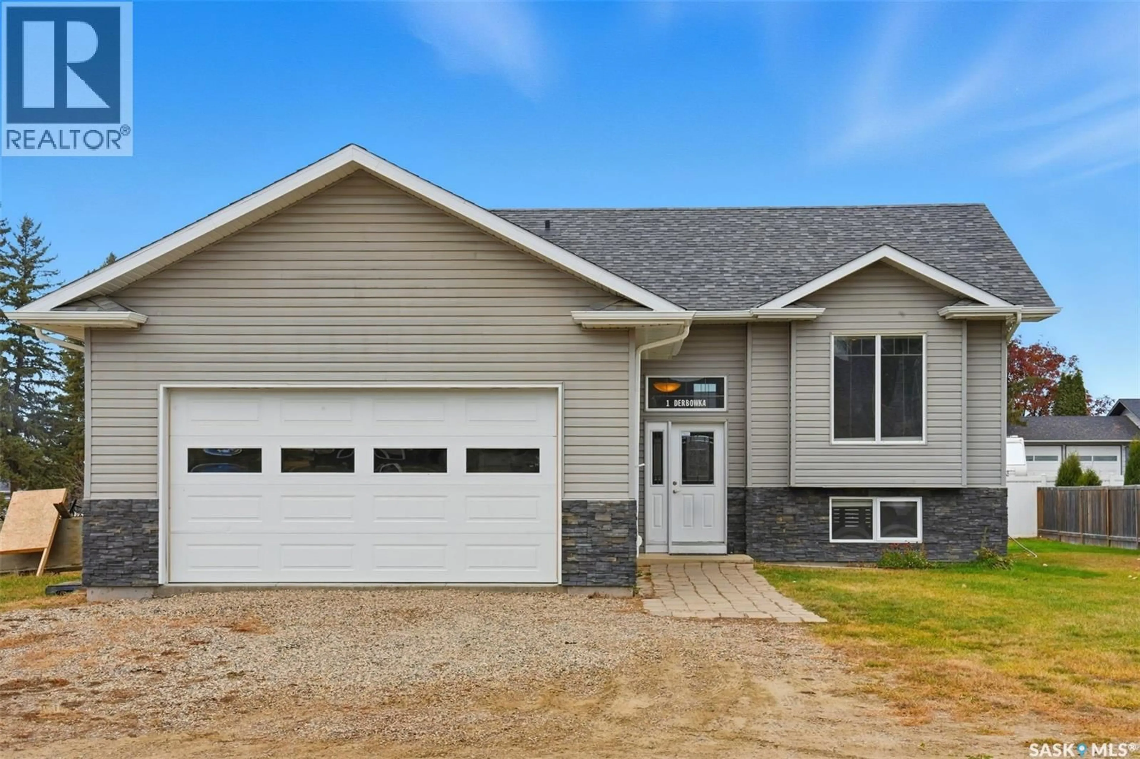 Home with vinyl exterior material, street for 1 DERBOWKA DRIVE, Borden Saskatchewan S0K0N0
