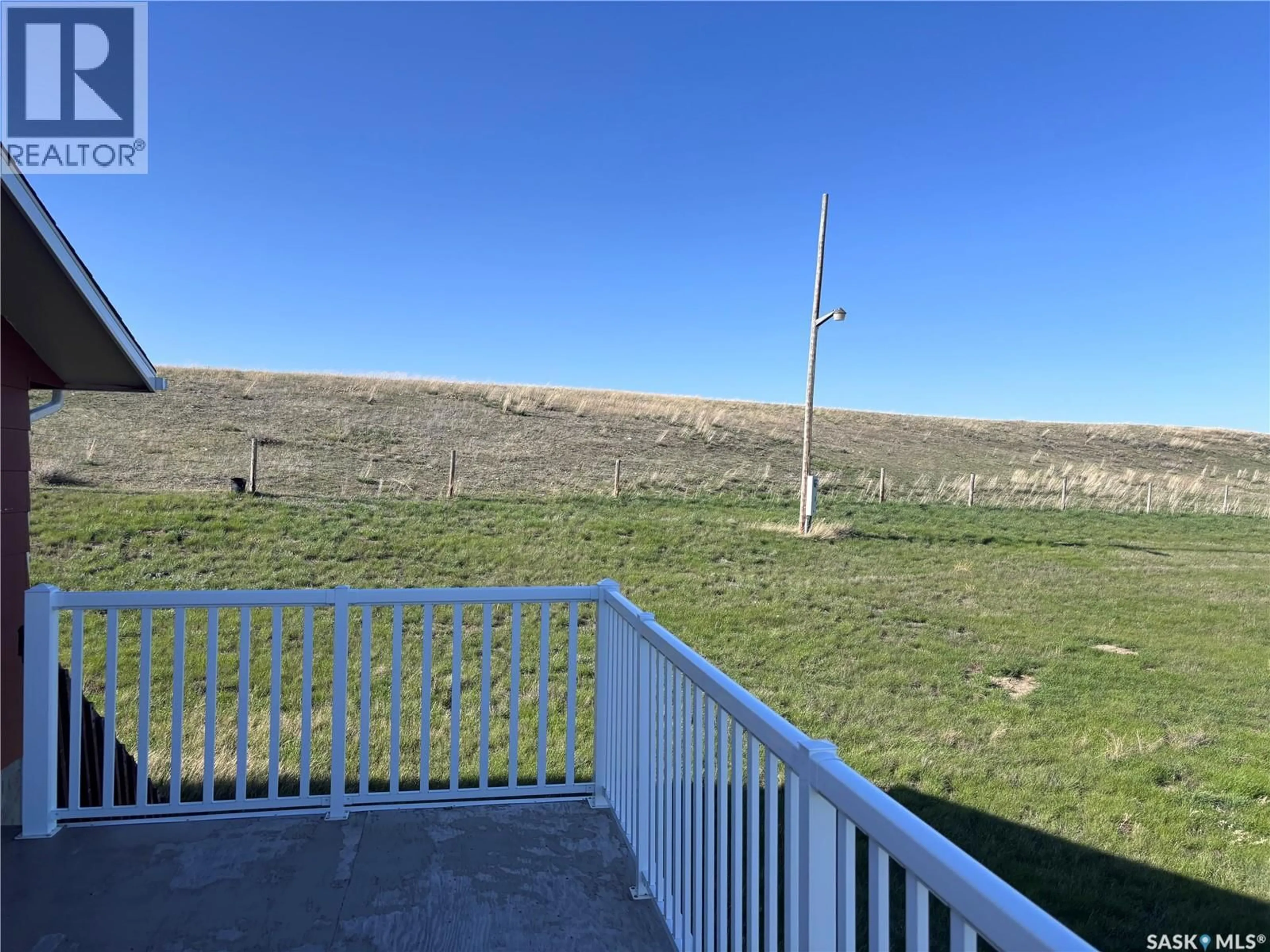 A pic from outside/outdoor area/front of a property/back of a property/a pic from drone, mountain view for ST.CYR ACREAGE, Swift Current Saskatchewan S9H3V6