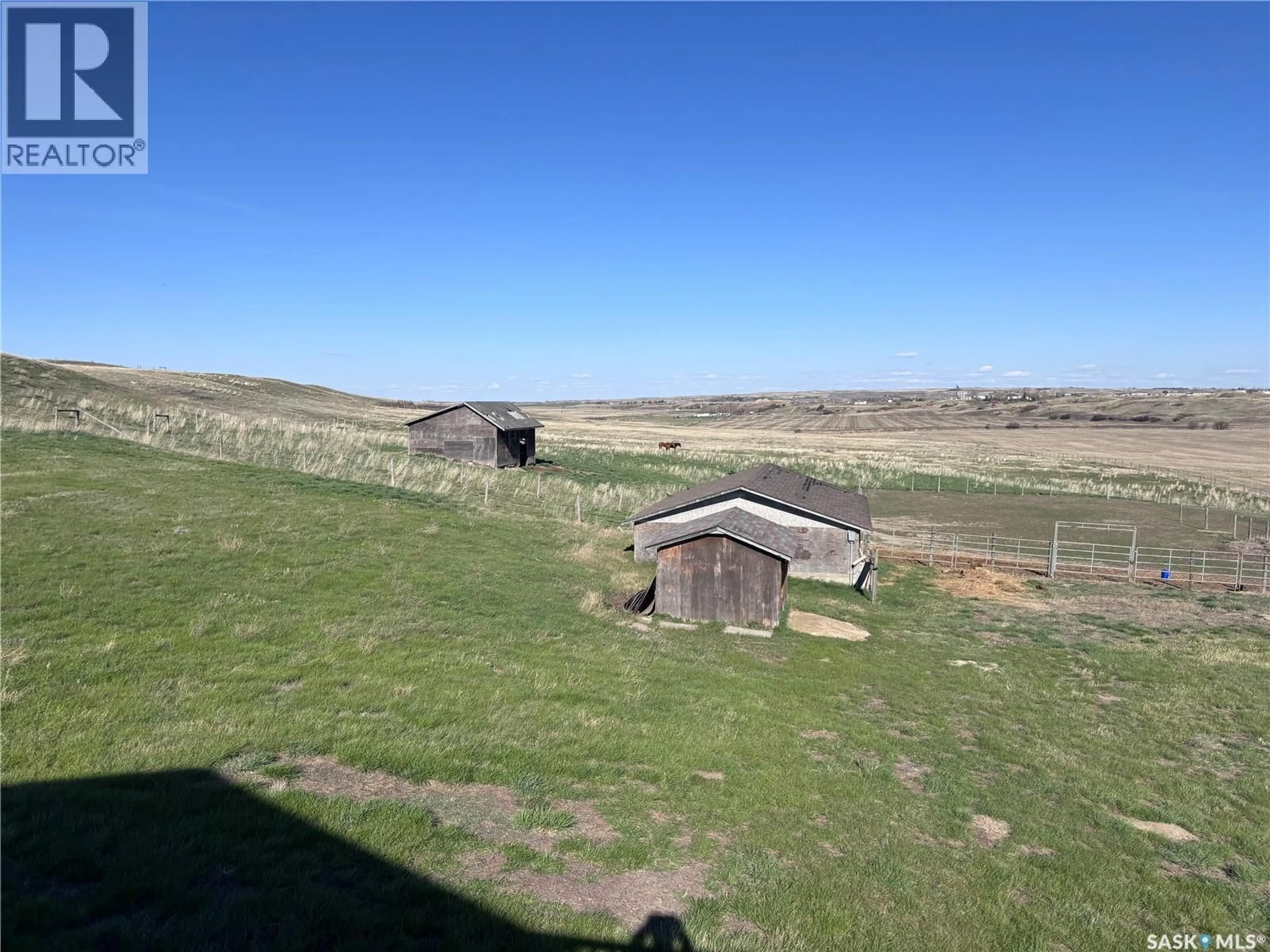 A pic from outside/outdoor area/front of a property/back of a property/a pic from drone, unknown for ST.CYR ACREAGE, Swift Current Saskatchewan S9H3V6