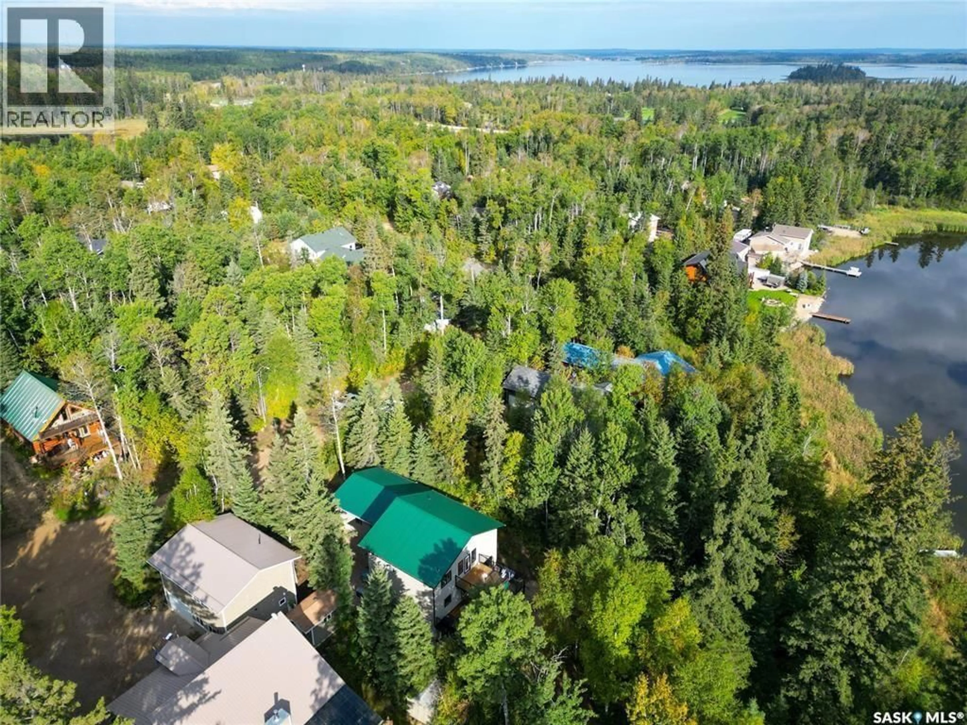 A pic from outside/outdoor area/front of a property/back of a property/a pic from drone, water/lake/river/ocean view for 1305 LAURIE PLACE, Paddockwood Rm No. 520 Saskatchewan S0J0N0