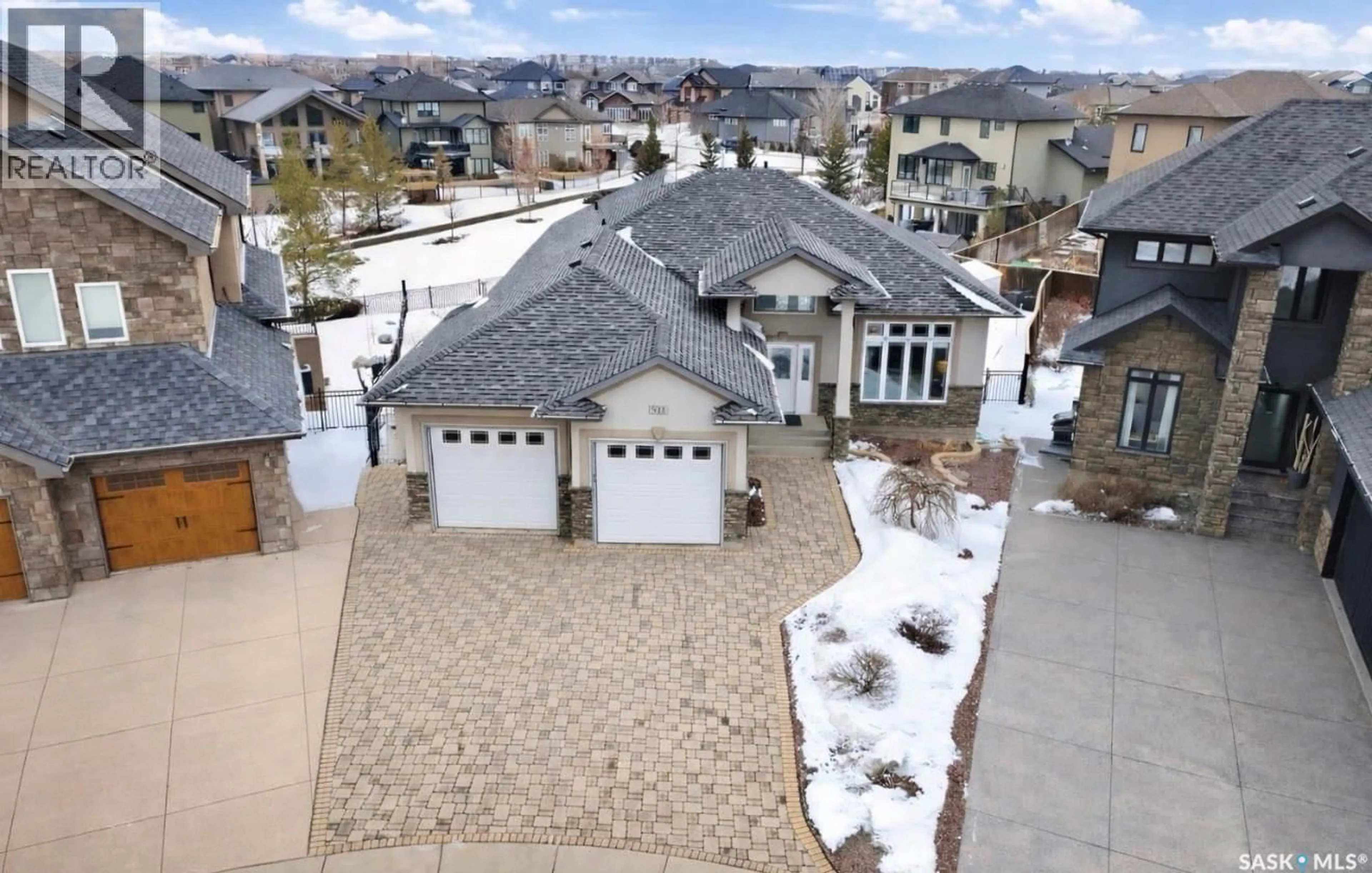 A pic from outside/outdoor area/front of a property/back of a property/a pic from drone, street for 511 BENNION TERRACE, Saskatoon Saskatchewan S7W0H2