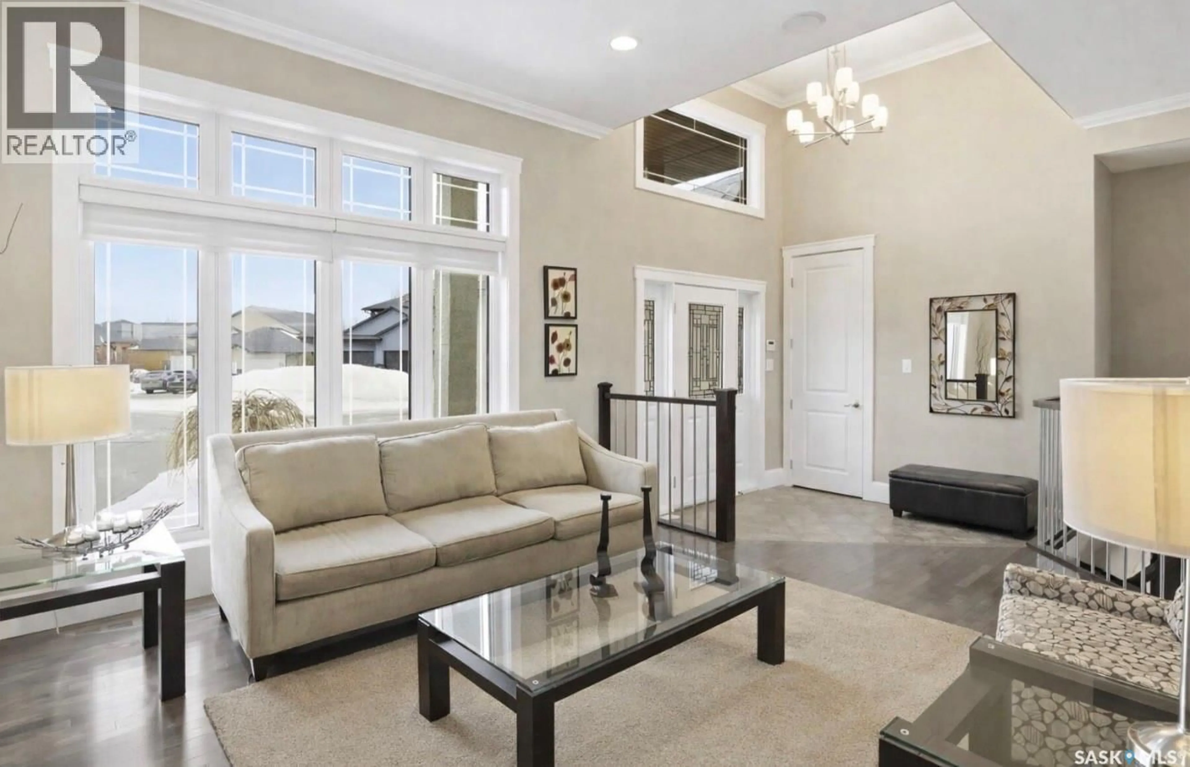 Living room with furniture, ceramic/tile floor for 511 BENNION TERRACE, Saskatoon Saskatchewan S7W0H2