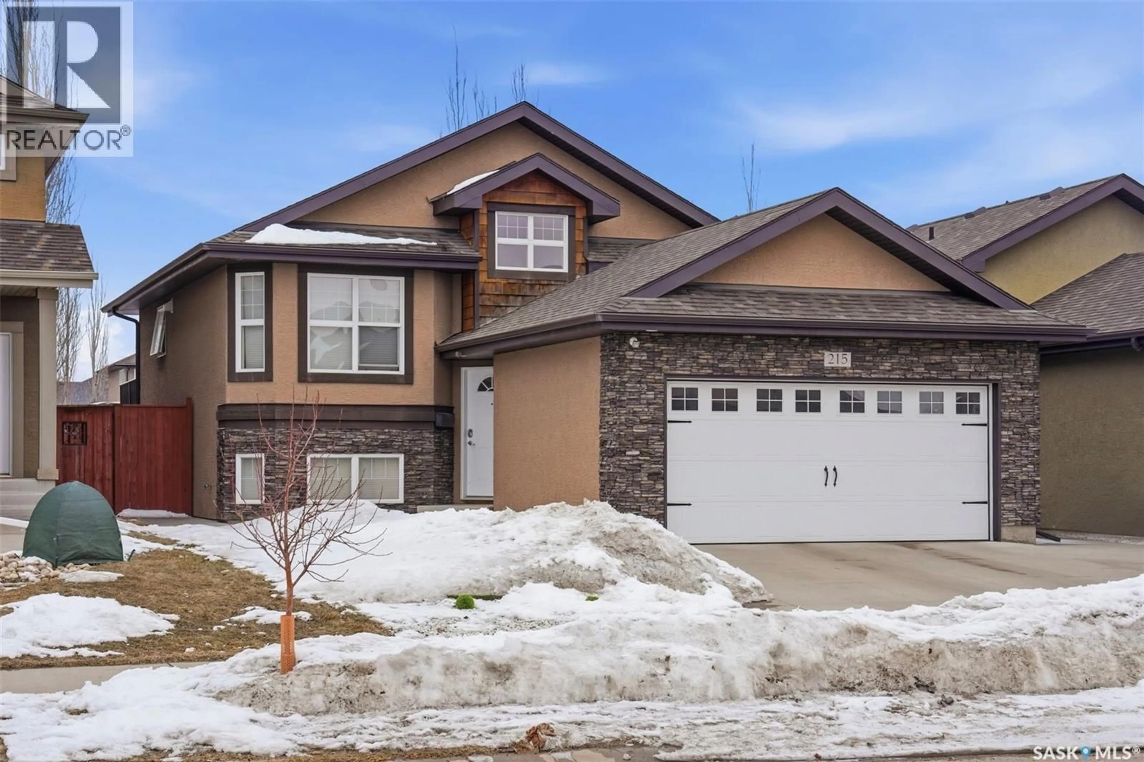 Home with brick exterior material, street for 215 SNELL CRESCENT, Saskatoon Saskatchewan S7T0M7