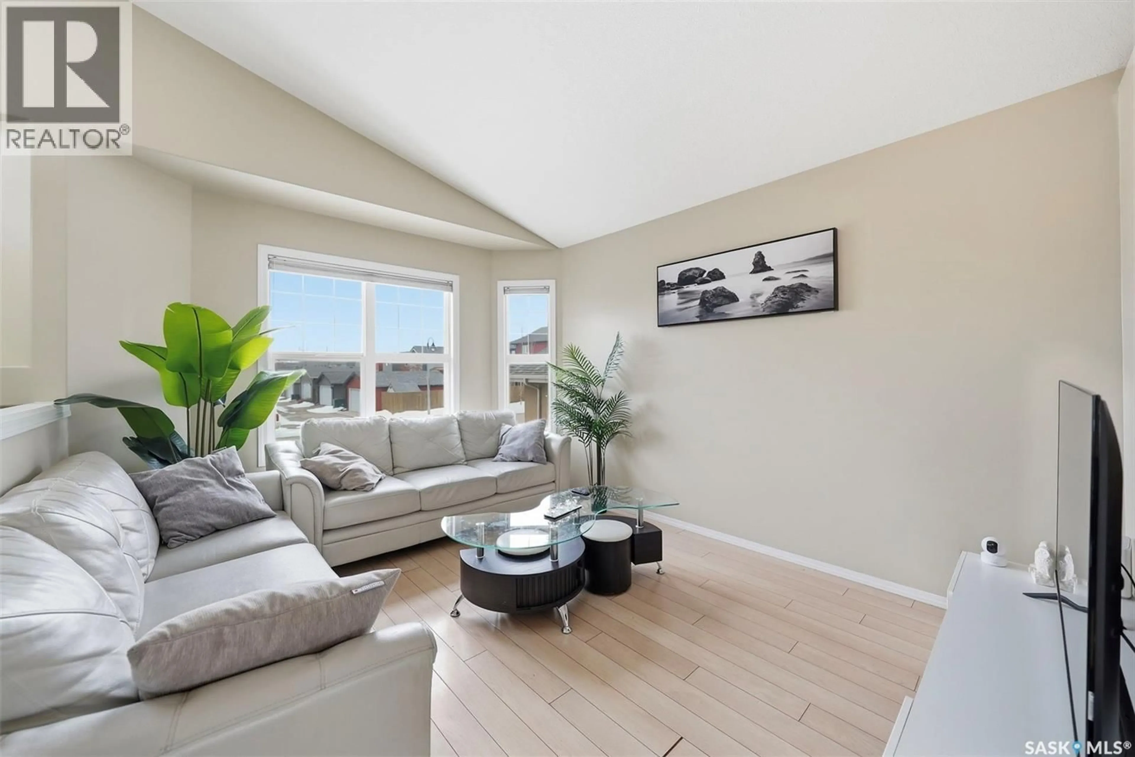 Living room with furniture, unknown for 215 SNELL CRESCENT, Saskatoon Saskatchewan S7T0M7