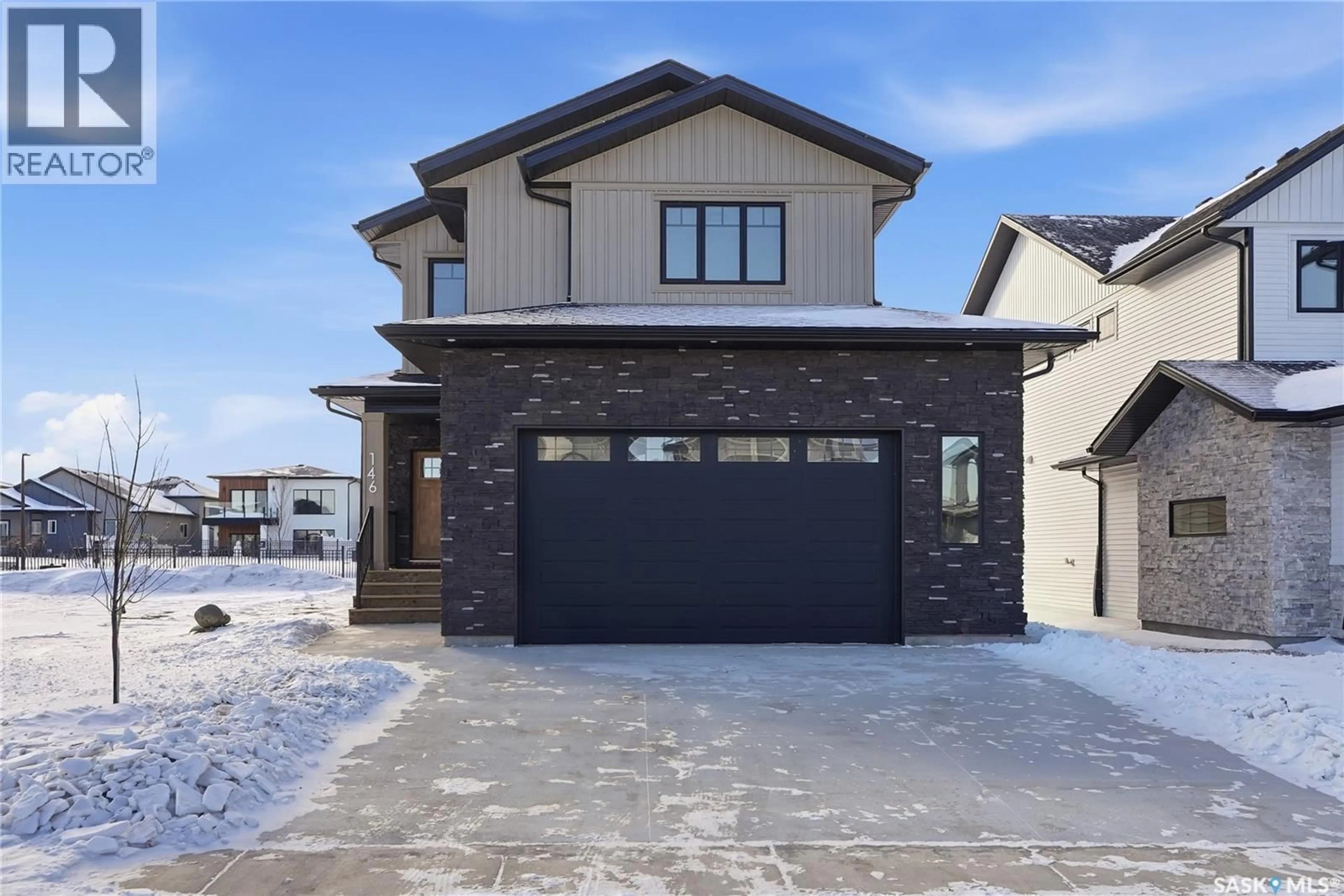 Home with brick exterior material, street for 154 HAVERSTOCK CRESCENT, Saskatoon Saskatchewan S7W1E3