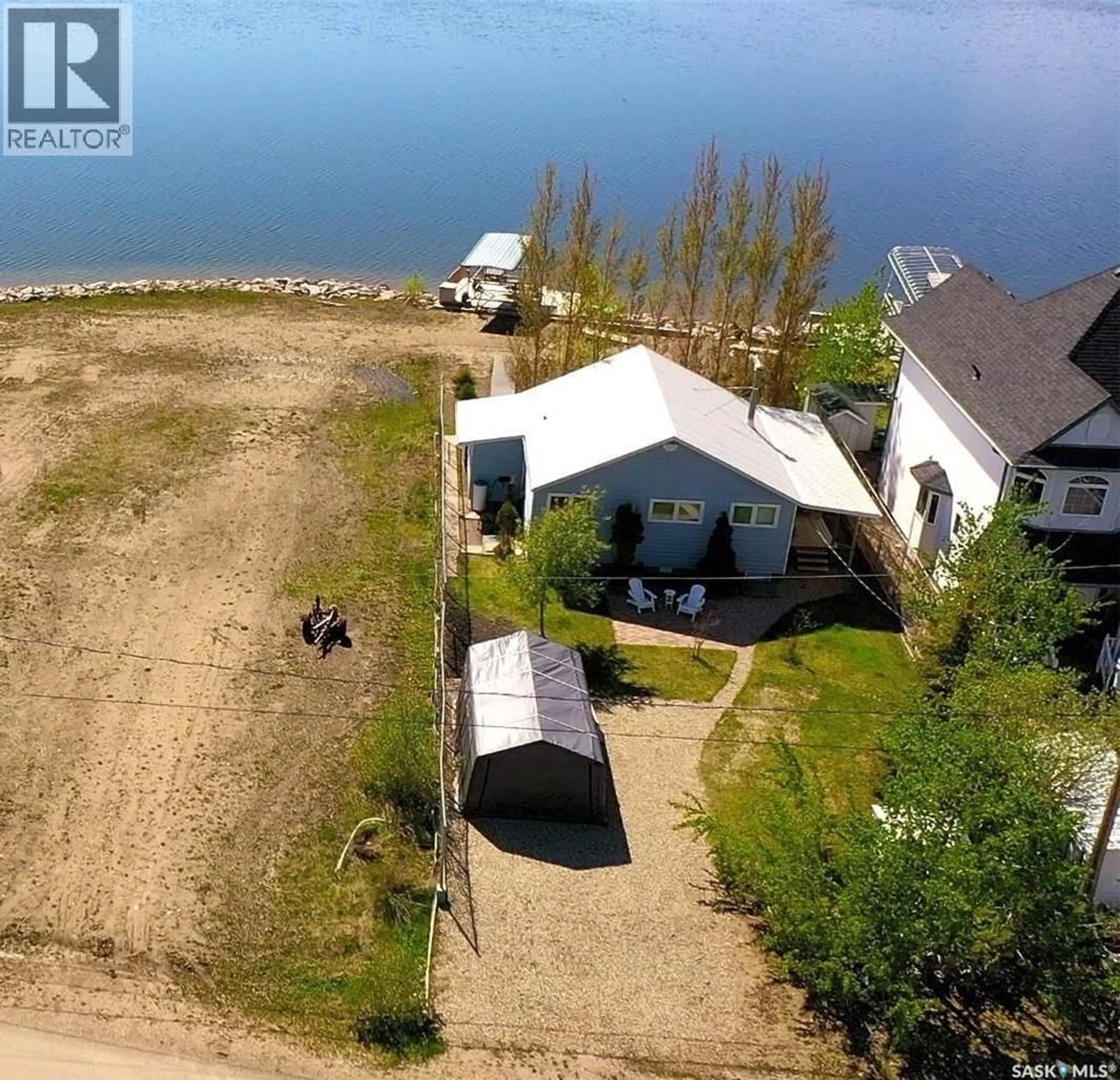 A pic from outside/outdoor area/front of a property/back of a property/a pic from drone, water/lake/river/ocean view for 184 SHORELINE DRIVE, Fishing Lake Saskatchewan S0A1Y0