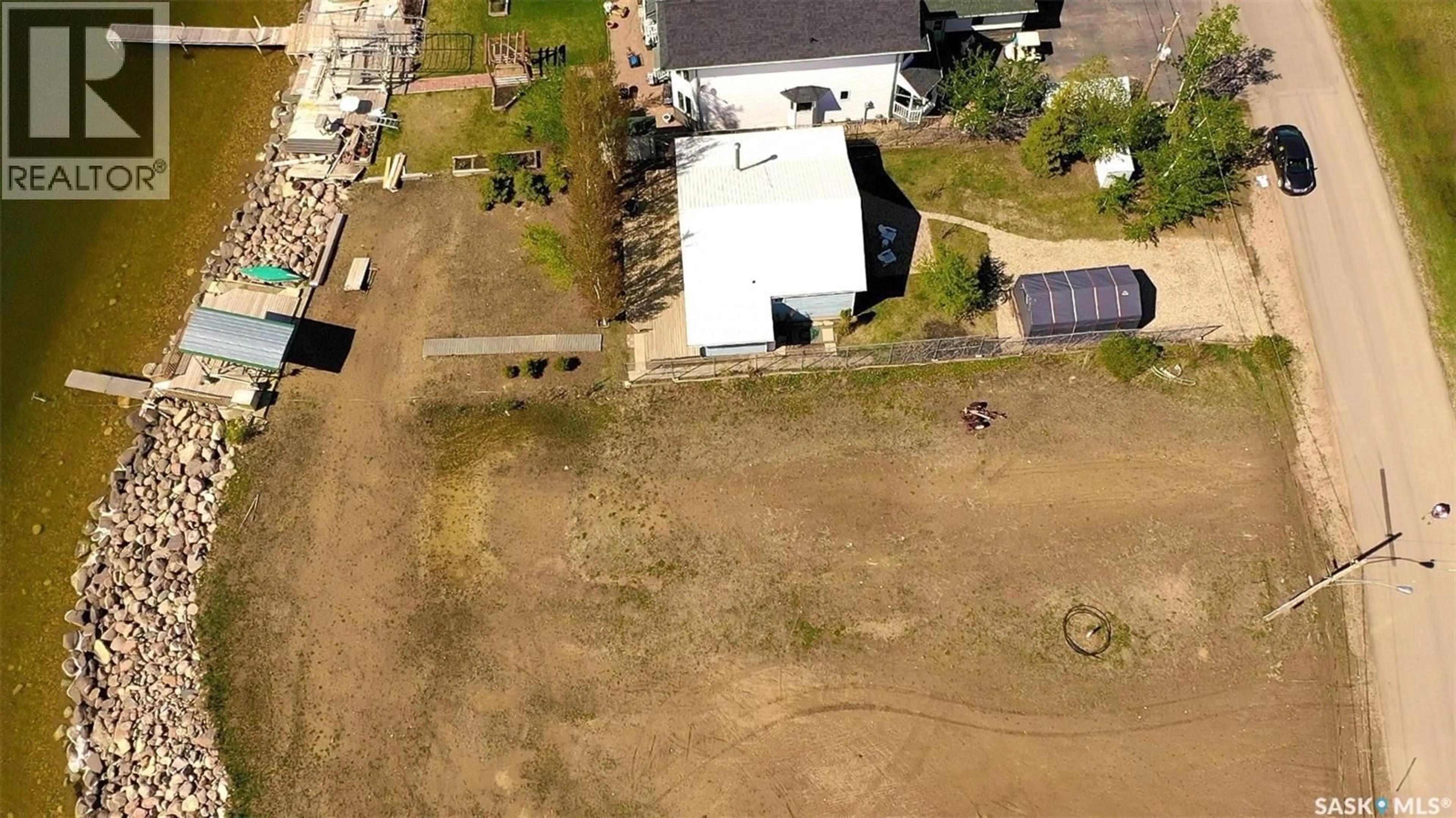 A pic from outside/outdoor area/front of a property/back of a property/a pic from drone, street for 184 SHORELINE DRIVE, Fishing Lake Saskatchewan S0A1Y0
