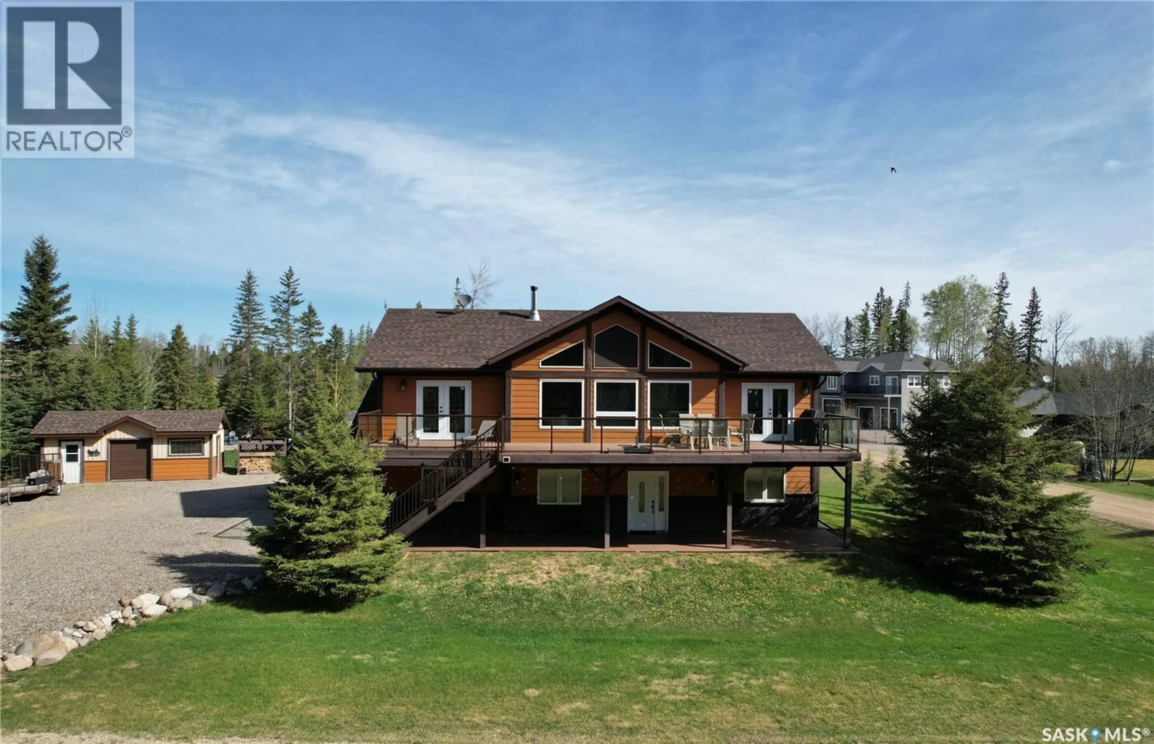 A pic from outside/outdoor area/front of a property/back of a property/a pic from drone, mountain view for 1 WEDGE ALLEY, Candle Lake Saskatchewan S0J3E0