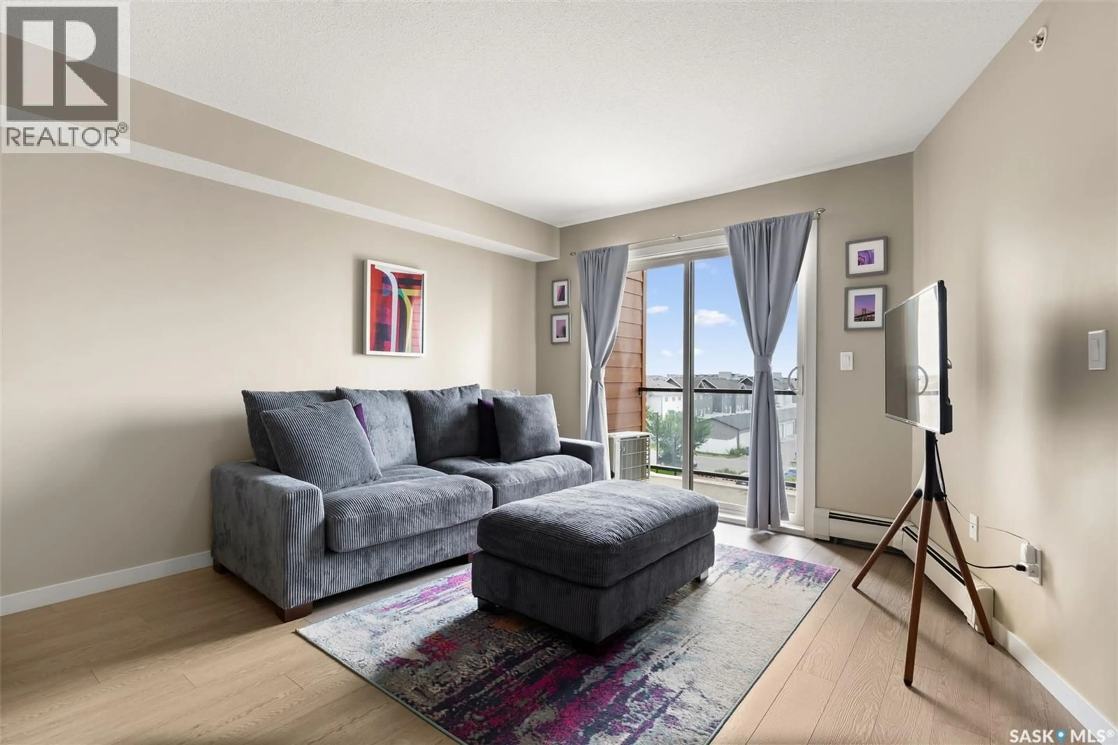 Living room with furniture, unknown for 5500 - 1404 MITCHINSON WAY, Regina Saskatchewan S4W0N9