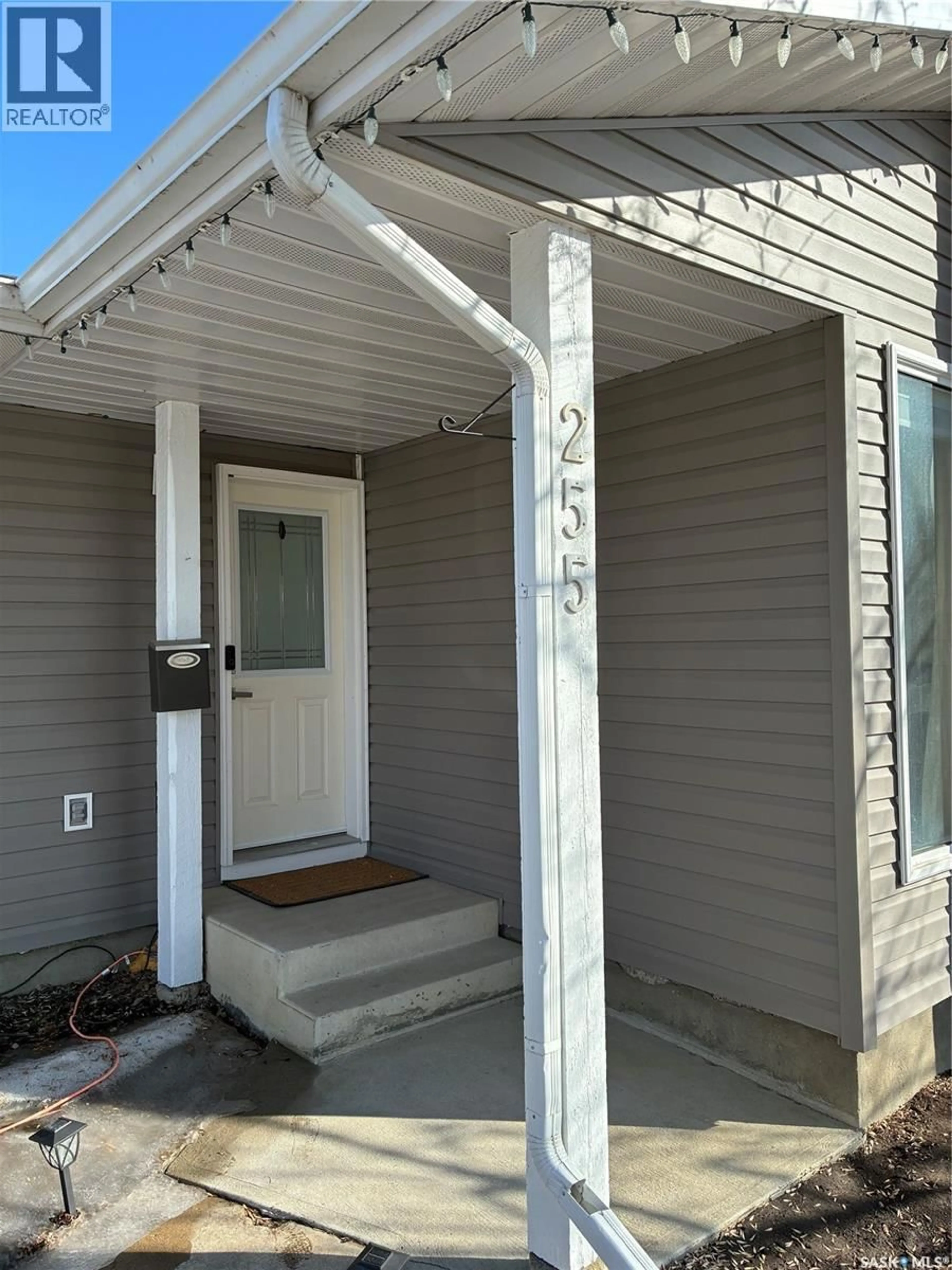 Home with vinyl exterior material, street for 255 WRIGLEY CRESCENT, Saskatoon Saskatchewan S7M4Y3