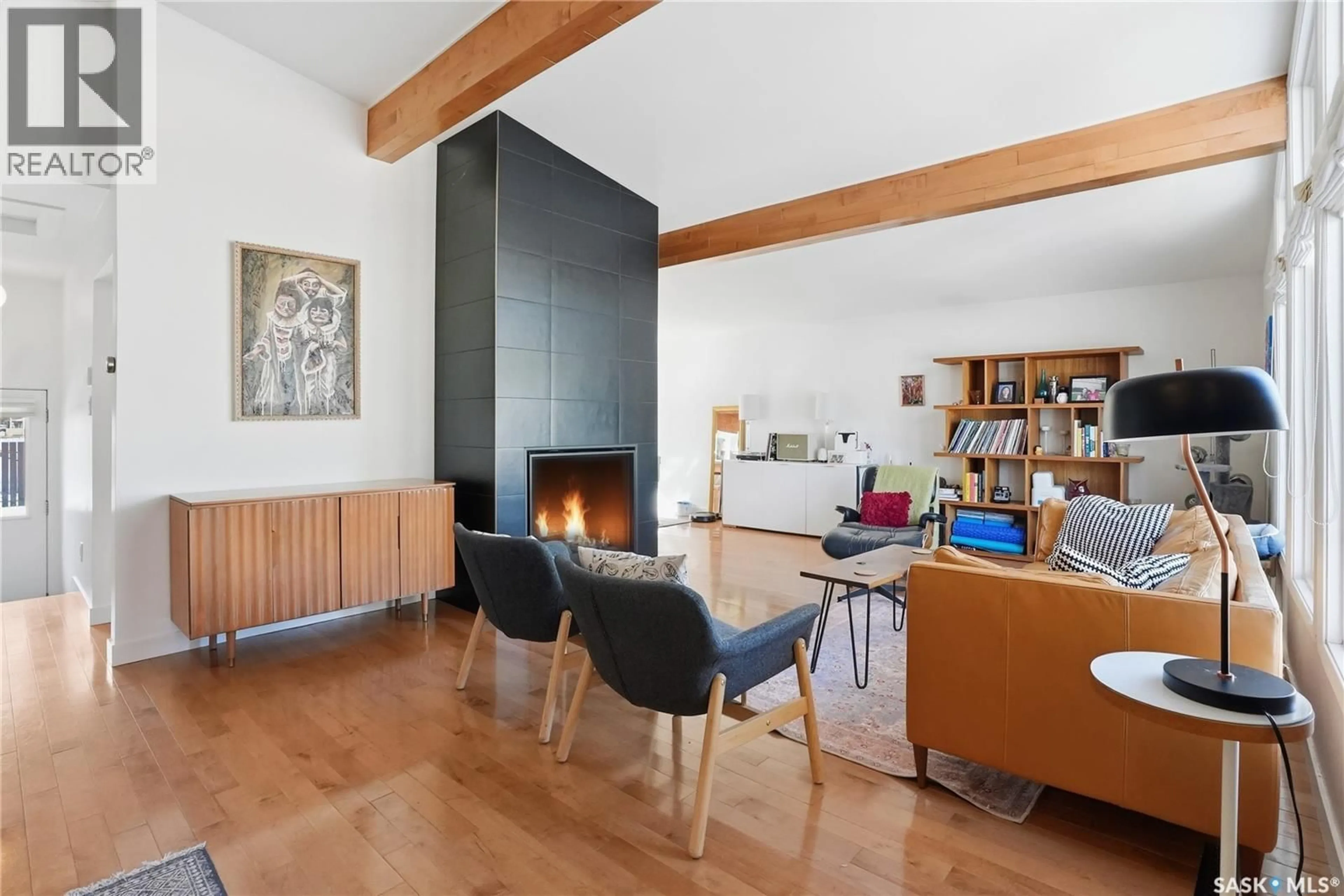 Living room with furniture, wood/laminate floor for 3539 BALFOUR STREET, Saskatoon Saskatchewan S7H3Z5