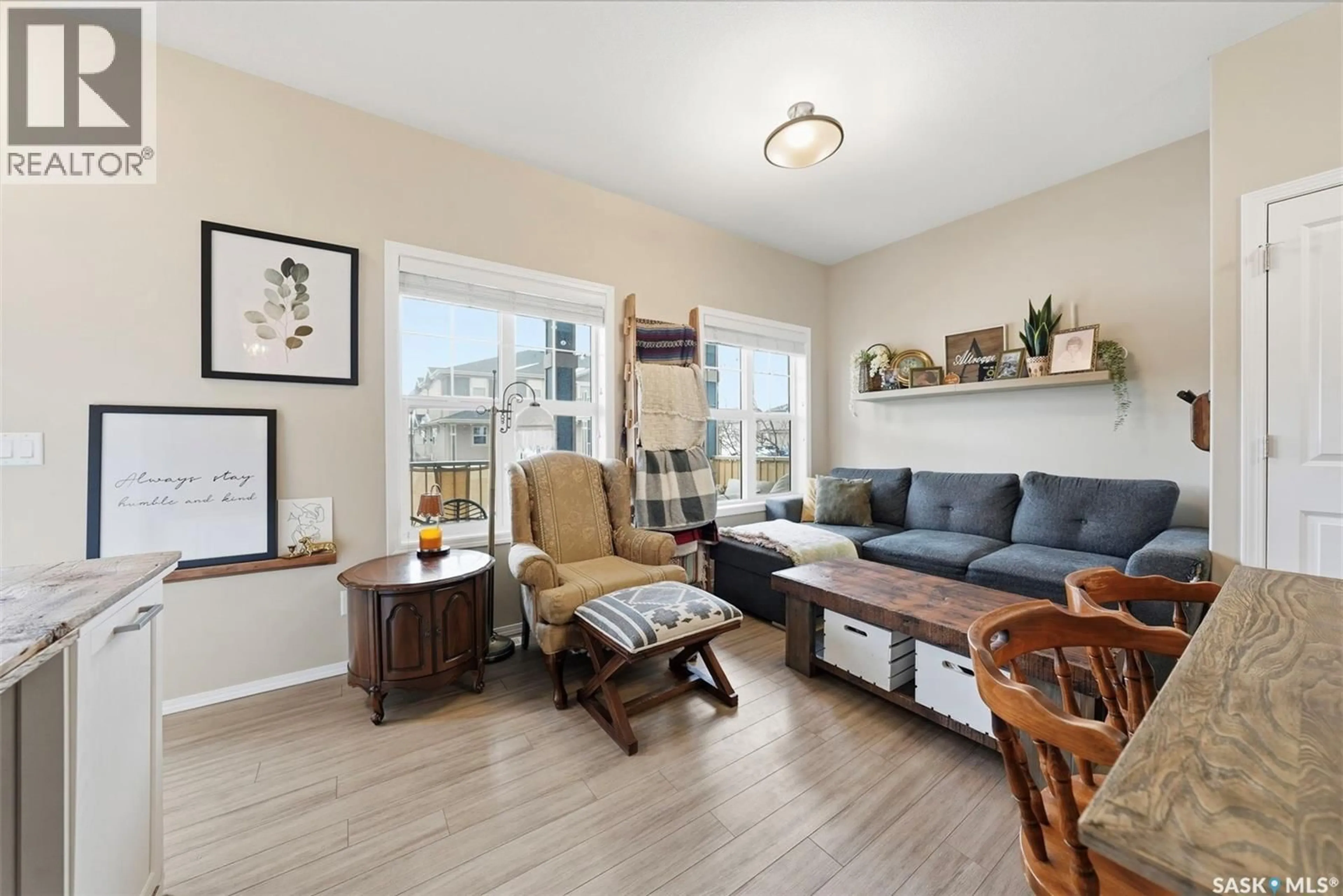 Living room with furniture, unknown for 100 - 105 CHAPARRAL BOULEVARD, Martensville Saskatchewan S0K0A2