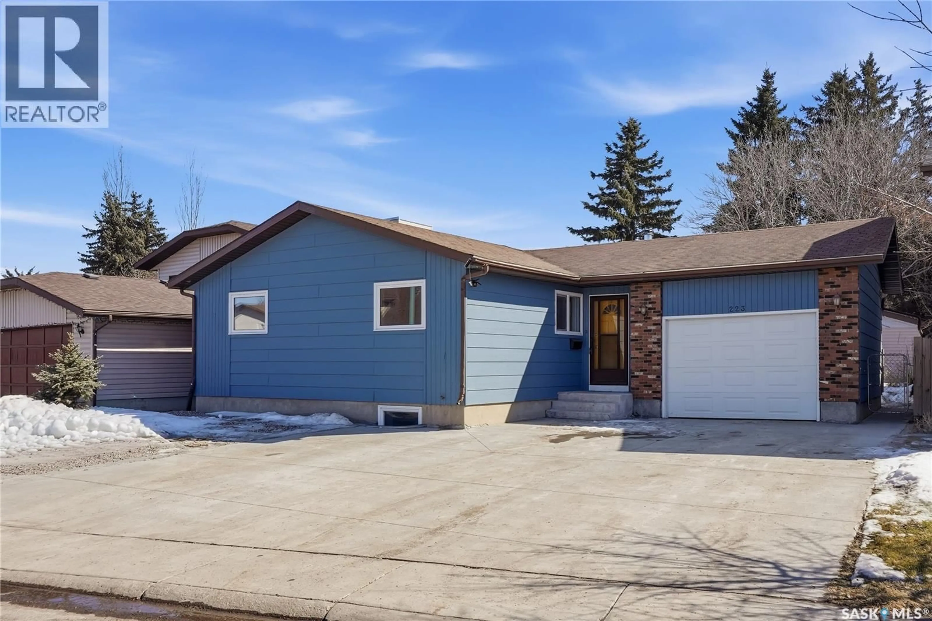Home with vinyl exterior material, street for 223 MEILICKE ROAD, Saskatoon Saskatchewan S7K5V6