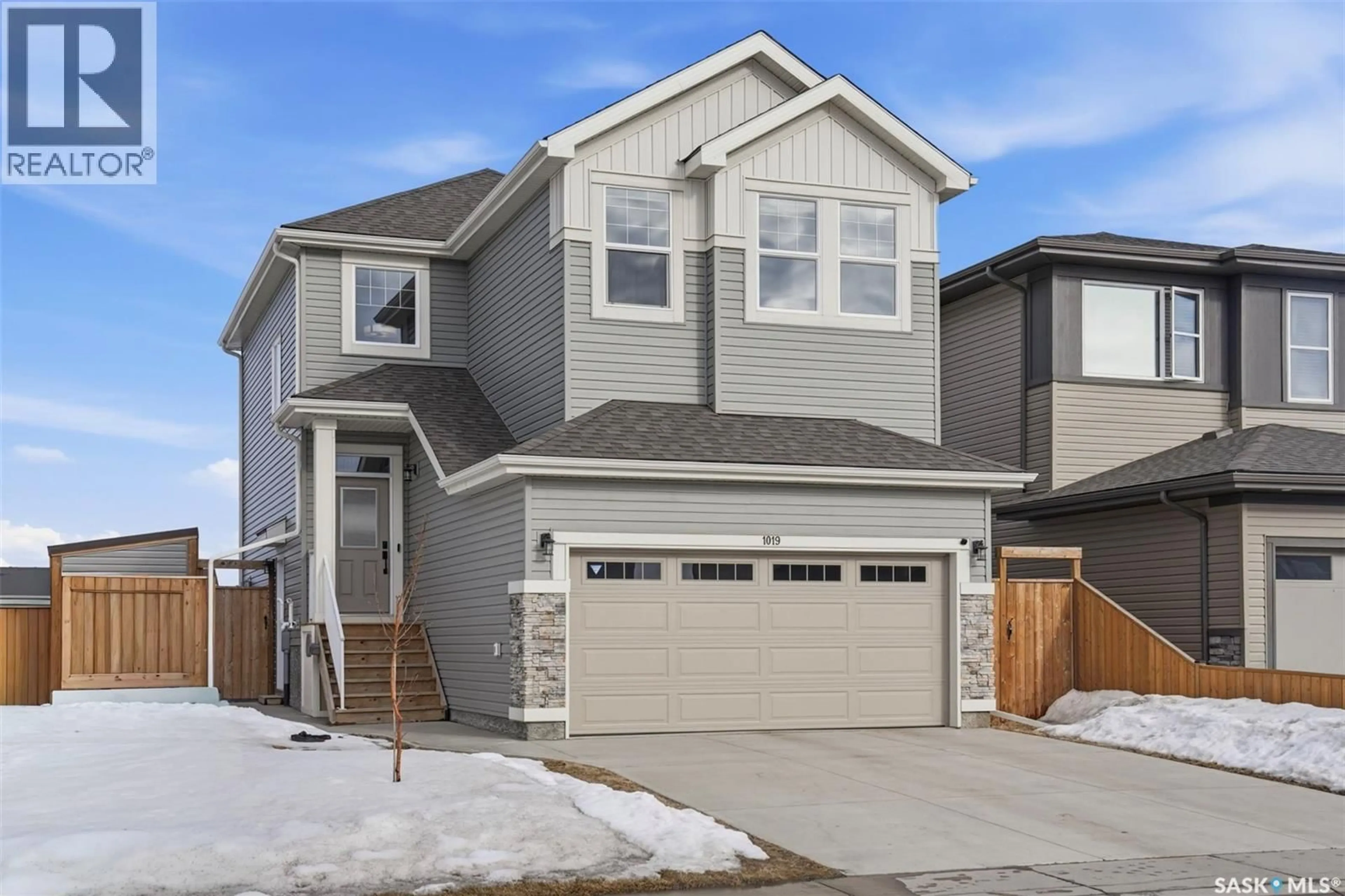 Home with vinyl exterior material, street for 1019 CHILDERS COURT, Saskatoon Saskatchewan S7L6T8