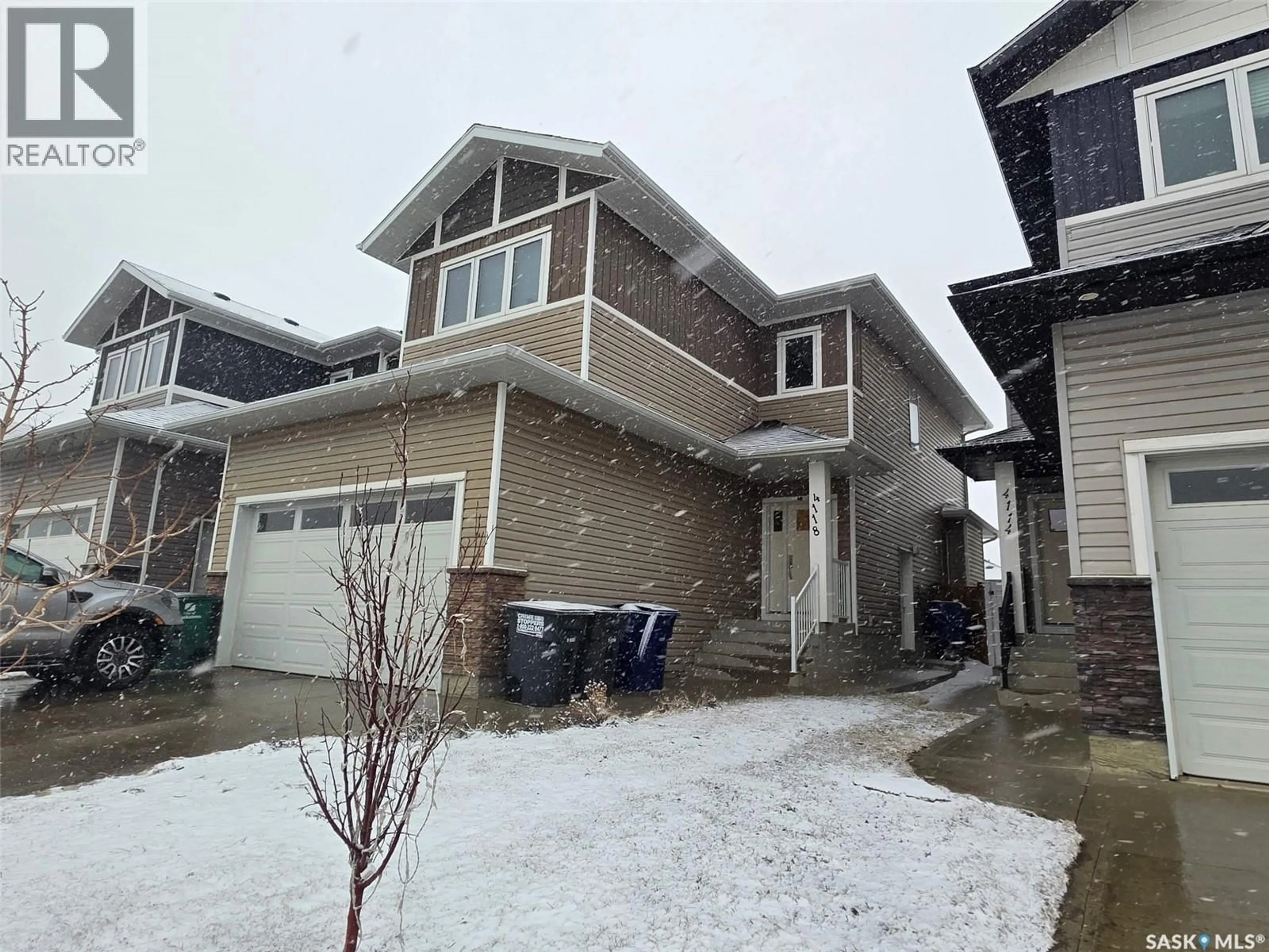 A pic from outside/outdoor area/front of a property/back of a property/a pic from drone, street for 4118 DIEFENBAKER DRIVE, Saskatoon Saskatchewan S7L6W8