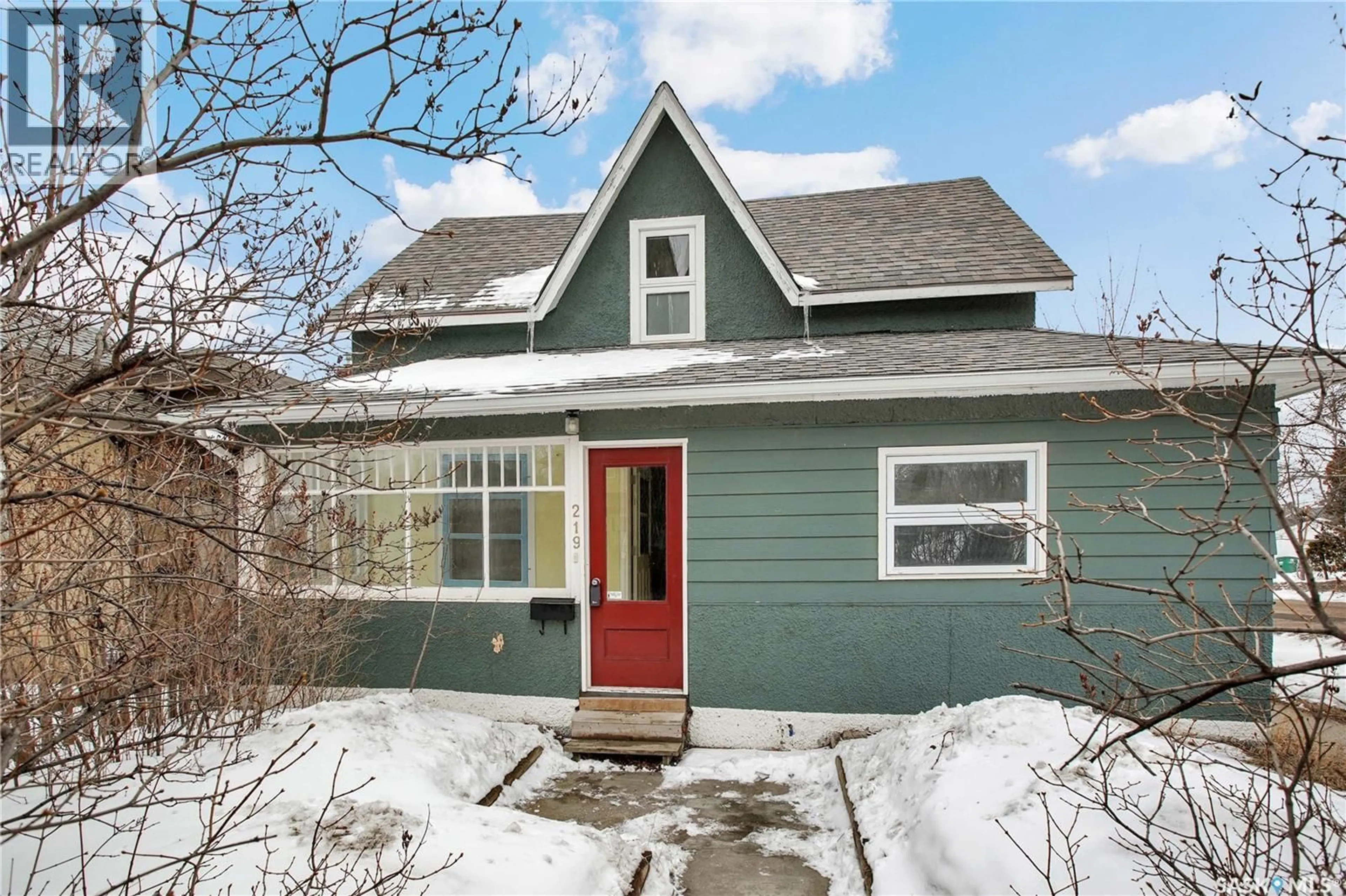 Home with vinyl exterior material, street for 219 27TH STREET, Saskatoon Saskatchewan S7L0J4