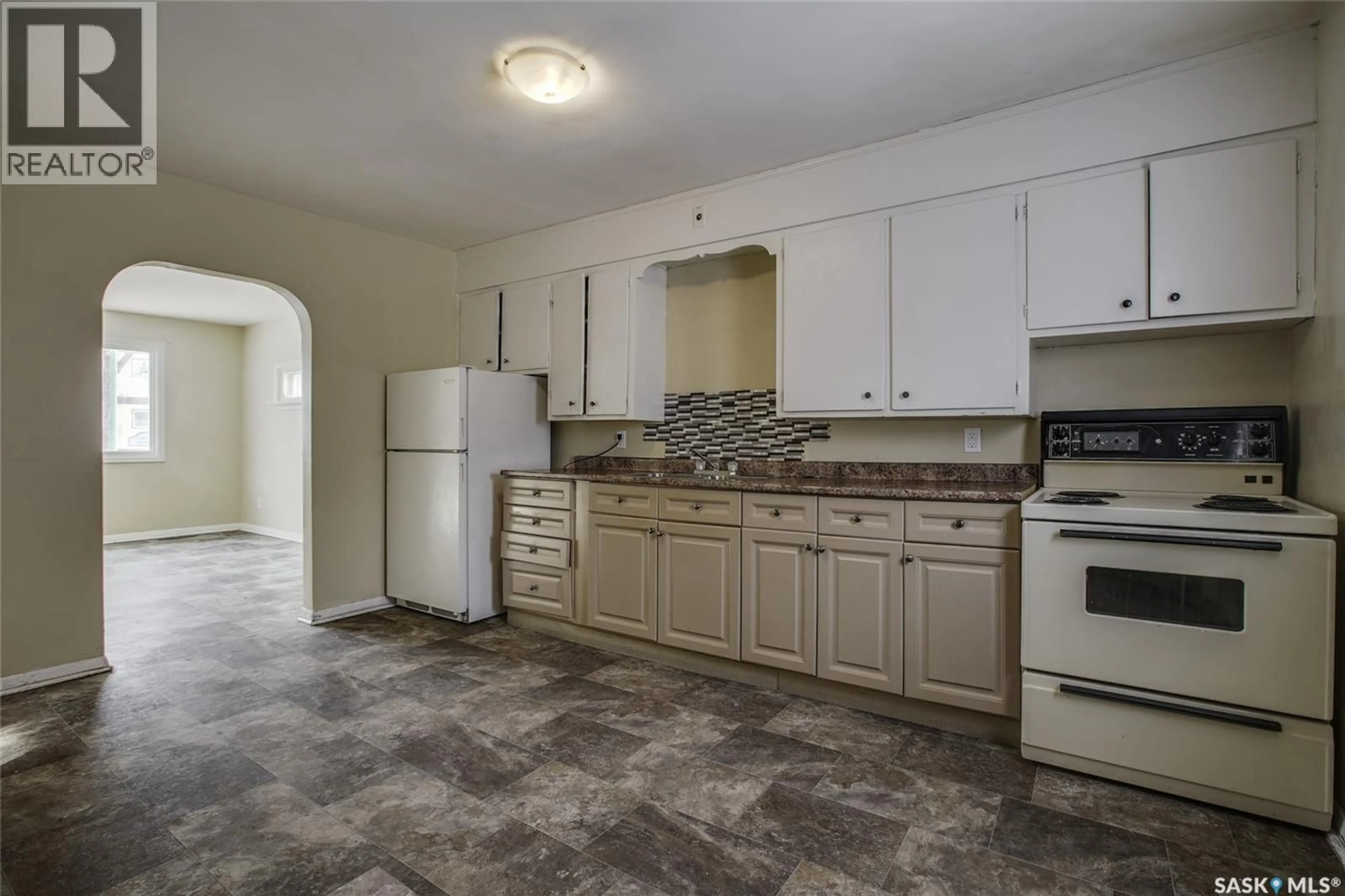 Standard kitchen, ceramic/tile floor for 327 Q AVENUE, Saskatoon Saskatchewan S7M2Y2