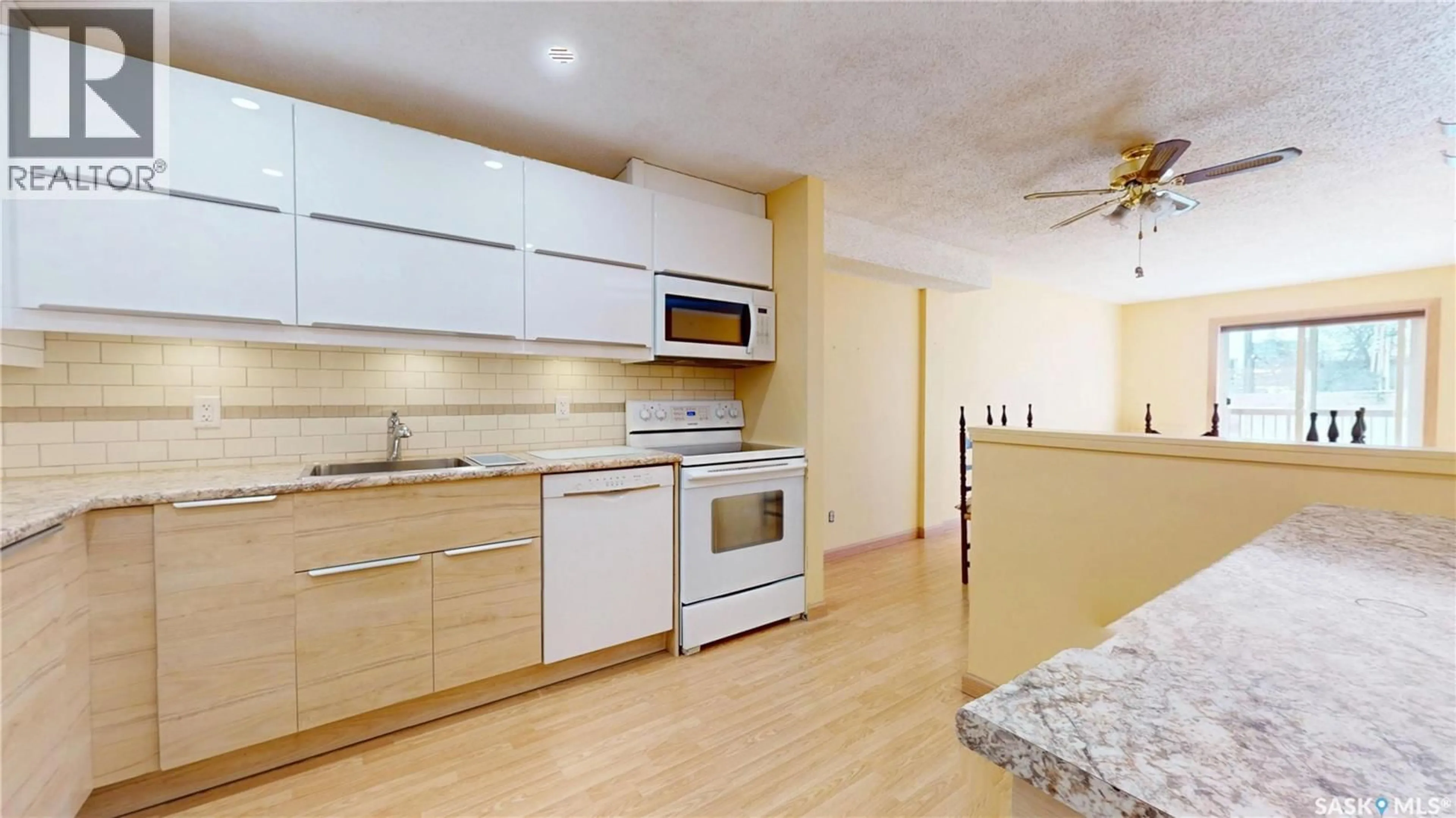 Standard kitchen, wood/laminate floor for 107 - 2727 VICTORIA AVENUE, Regina Saskatchewan S4T1K4