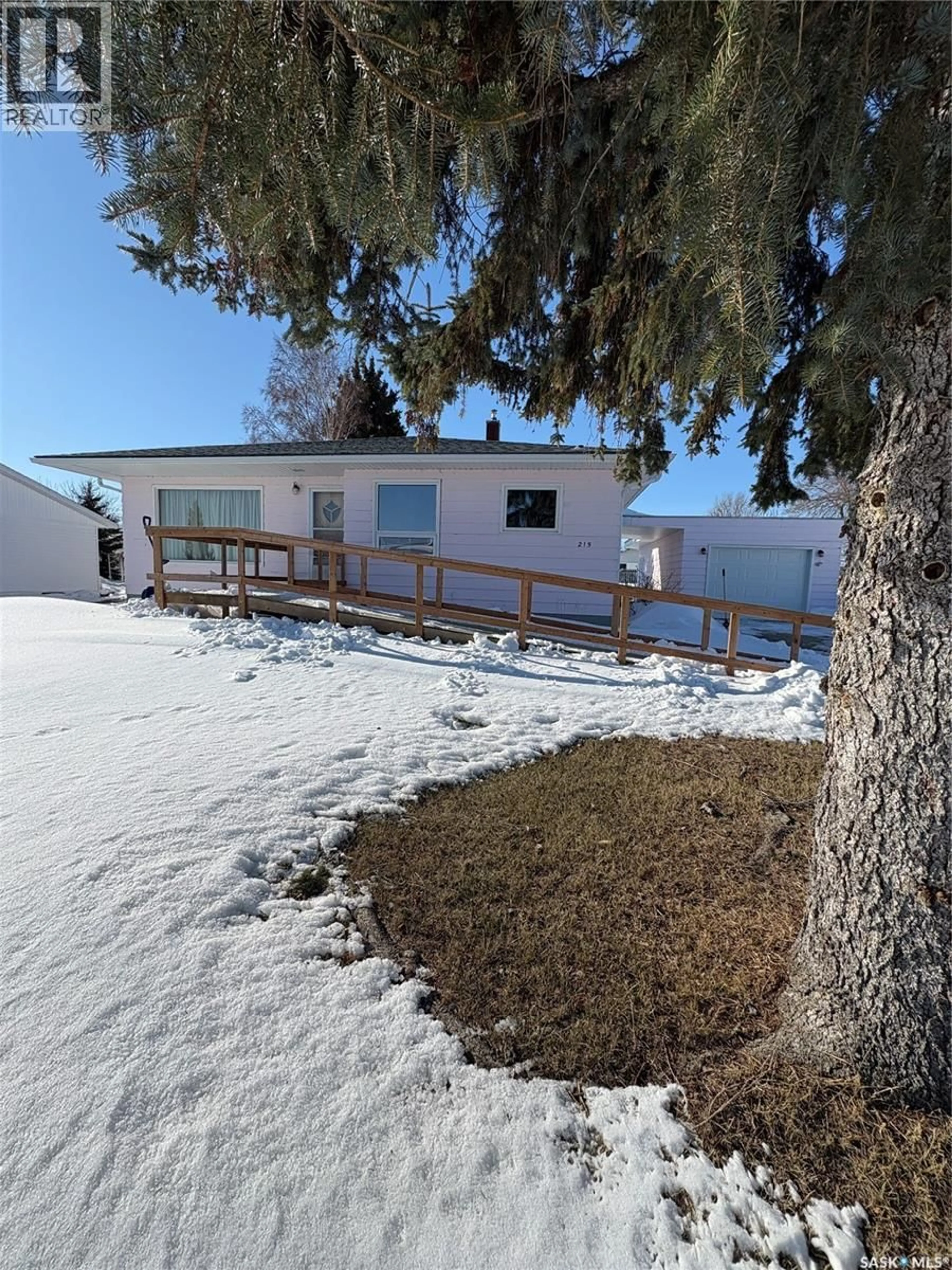 A pic from outside/outdoor area/front of a property/back of a property/a pic from drone, mountain view for 215 2ND AVENUE, Kelvington Saskatchewan S0A1W0