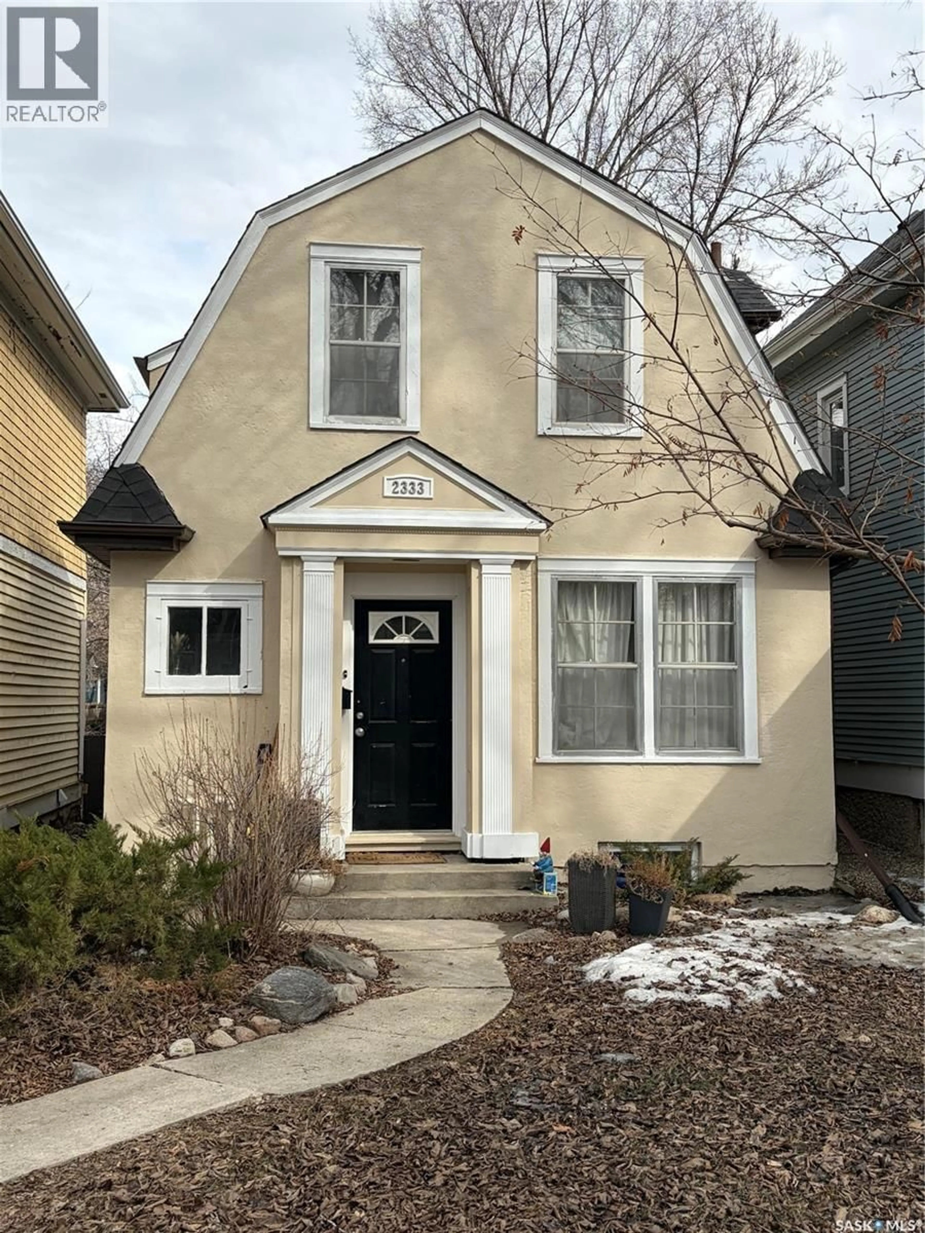 Home with vinyl exterior material, street for 2333 ROBINSON STREET, Regina Saskatchewan S4T2R3