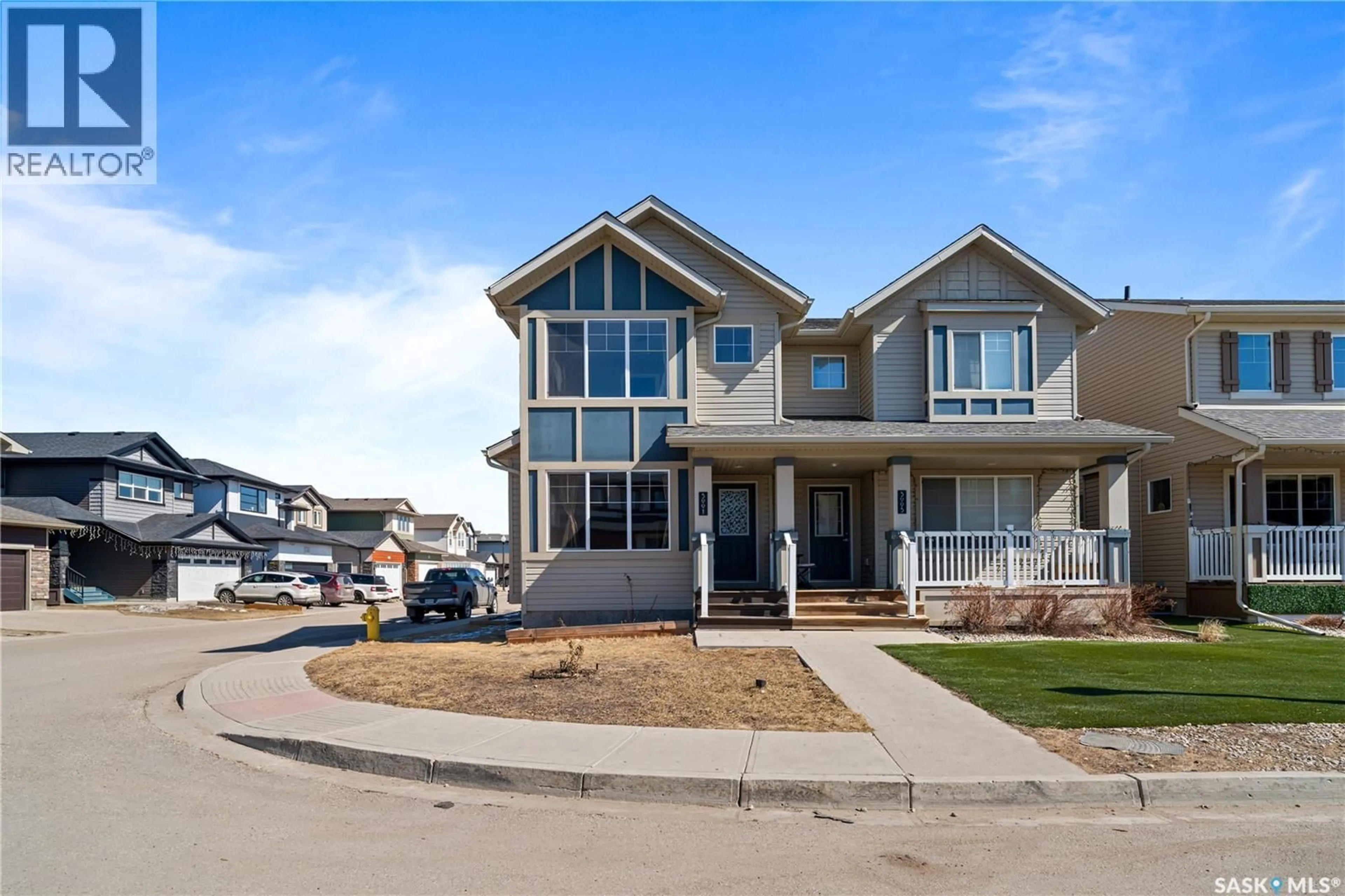Home with vinyl exterior material, street for 5001 CORNELL GATE, Regina Saskatchewan S4W0J2