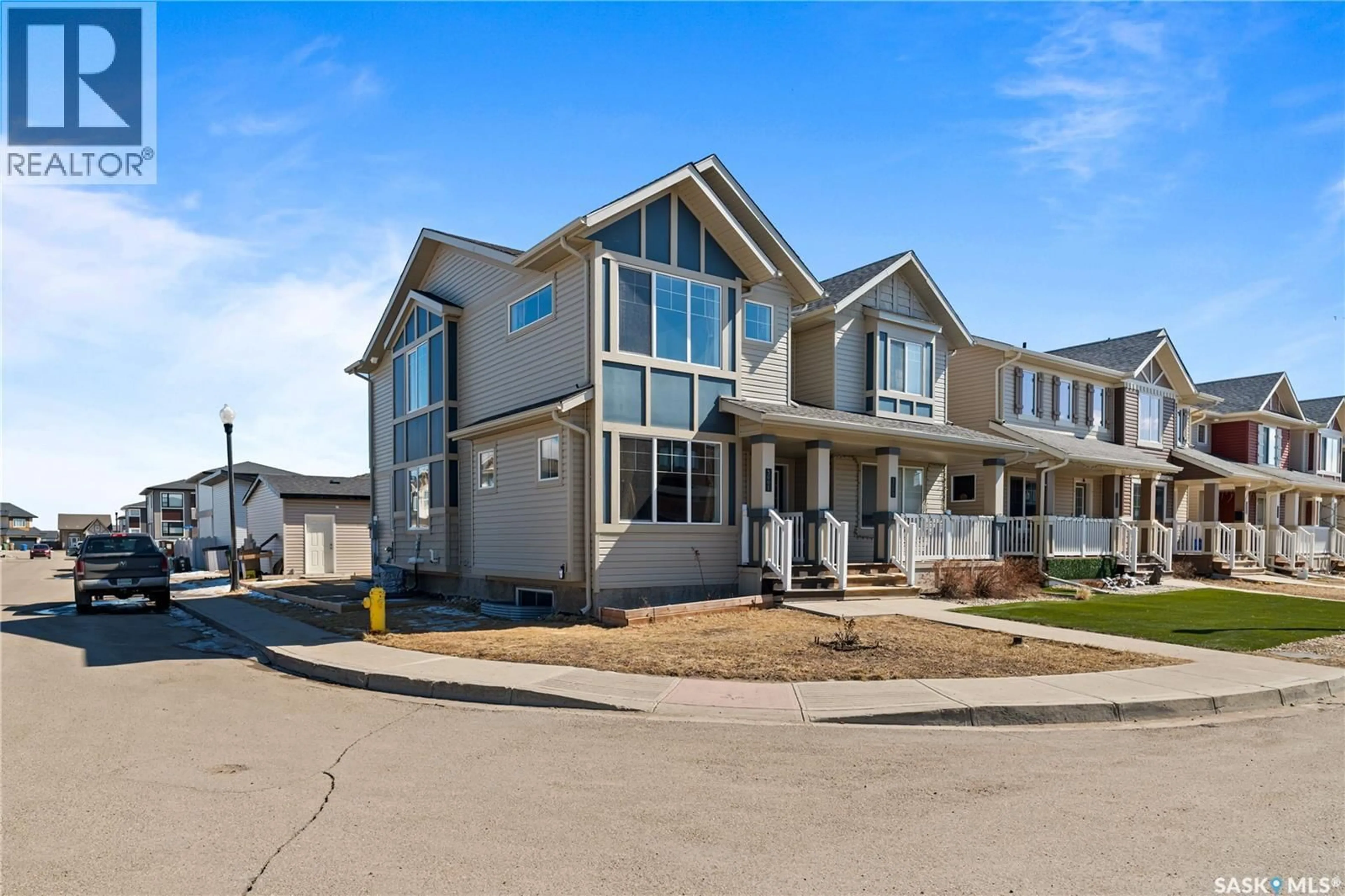 Home with vinyl exterior material, street for 5001 CORNELL GATE, Regina Saskatchewan S4W0J2