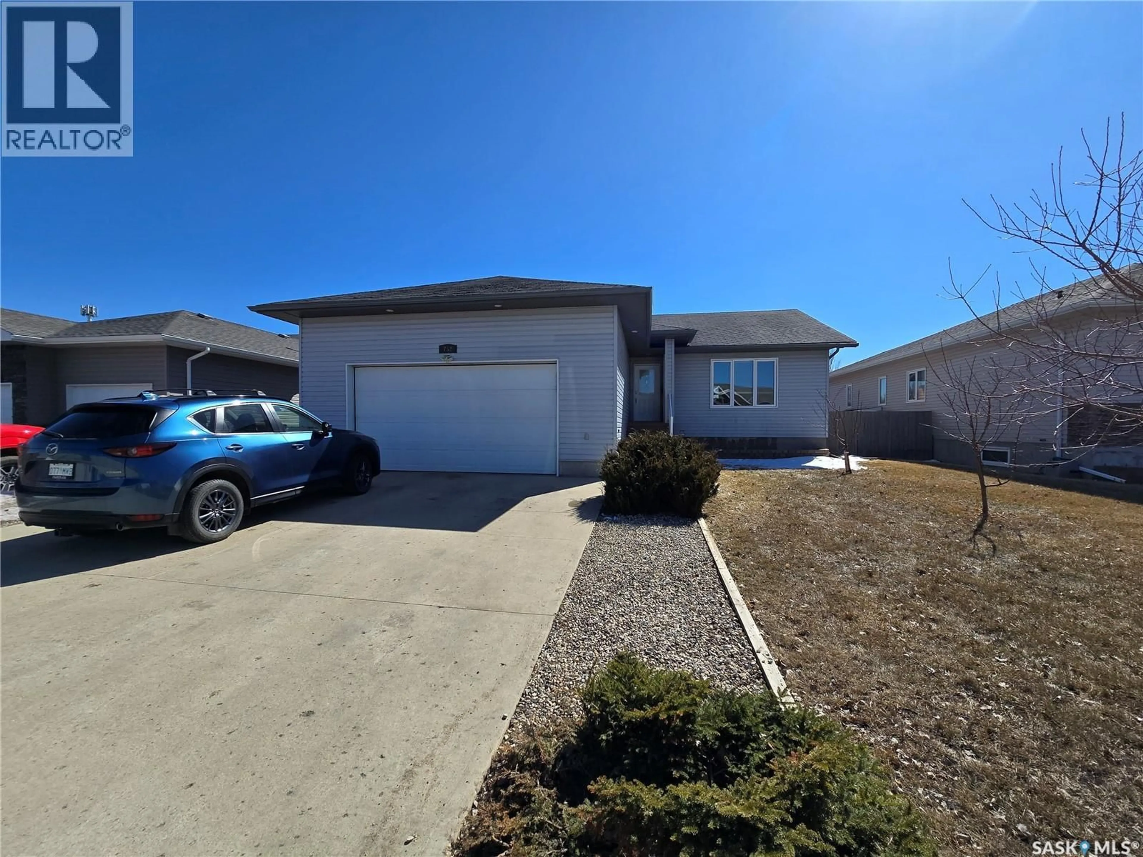 A pic from outside/outdoor area/front of a property/back of a property/a pic from drone, street for 752 MCTAGGART DRIVE, Weyburn Saskatchewan S4H3M6