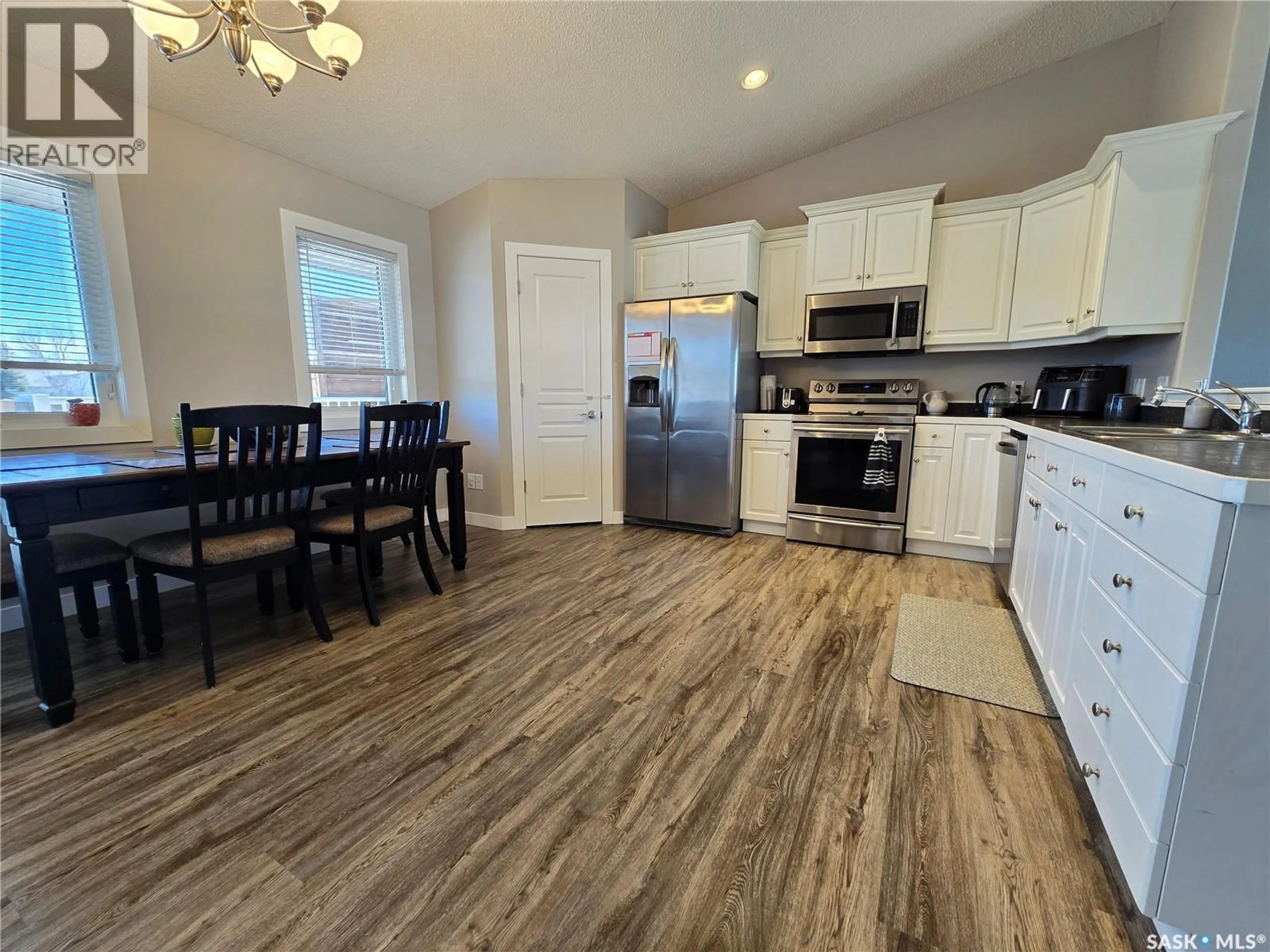 Open concept kitchen, unknown for 752 MCTAGGART DRIVE, Weyburn Saskatchewan S4H3M6