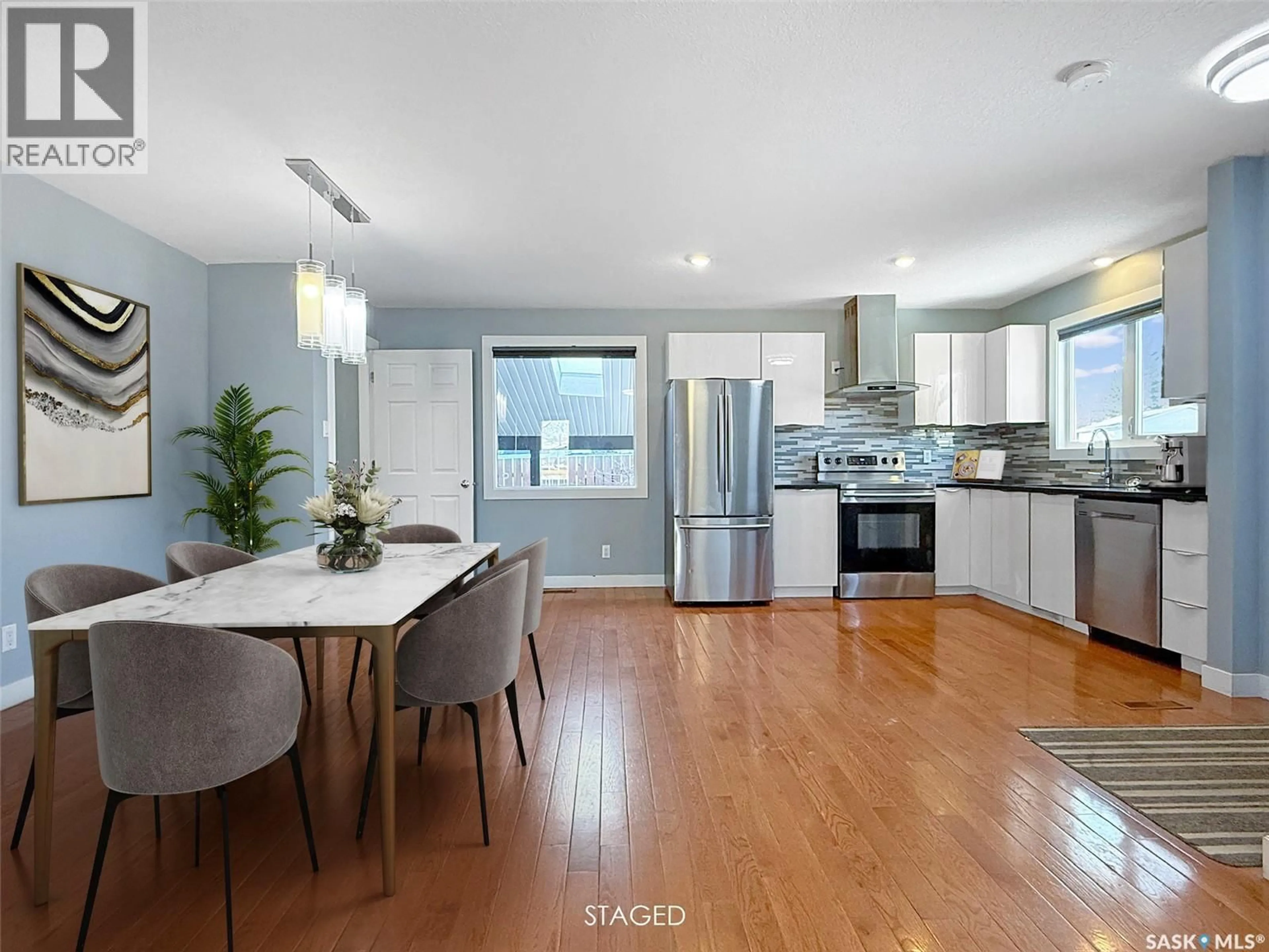 Open concept kitchen, wood/laminate floor for 210 CLINTON PLACE, Swift Current Saskatchewan S9H4K2