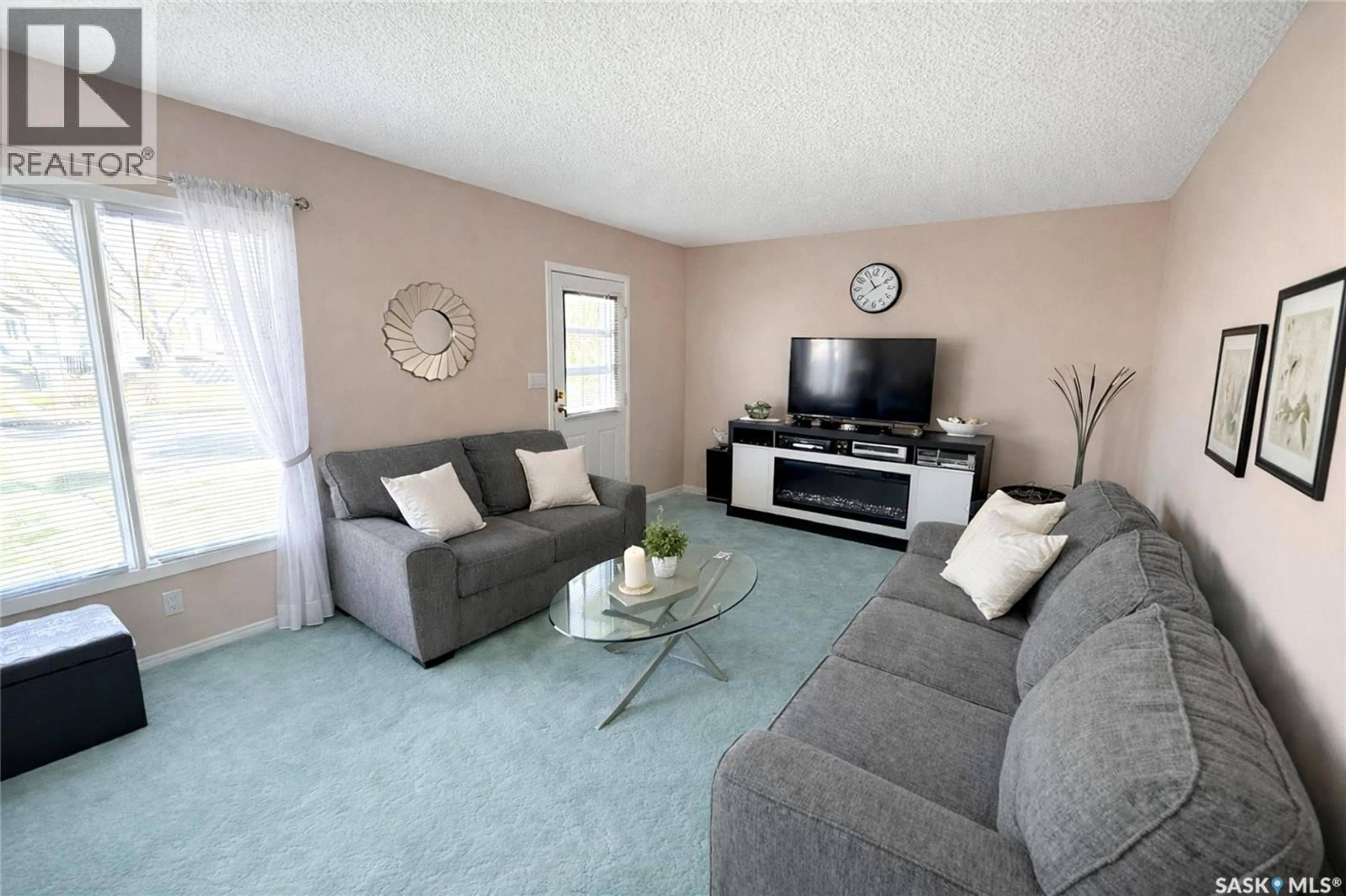 Living room with furniture, unknown for 215 COLLEGE AVENUE, Regina Saskatchewan S4N0W7