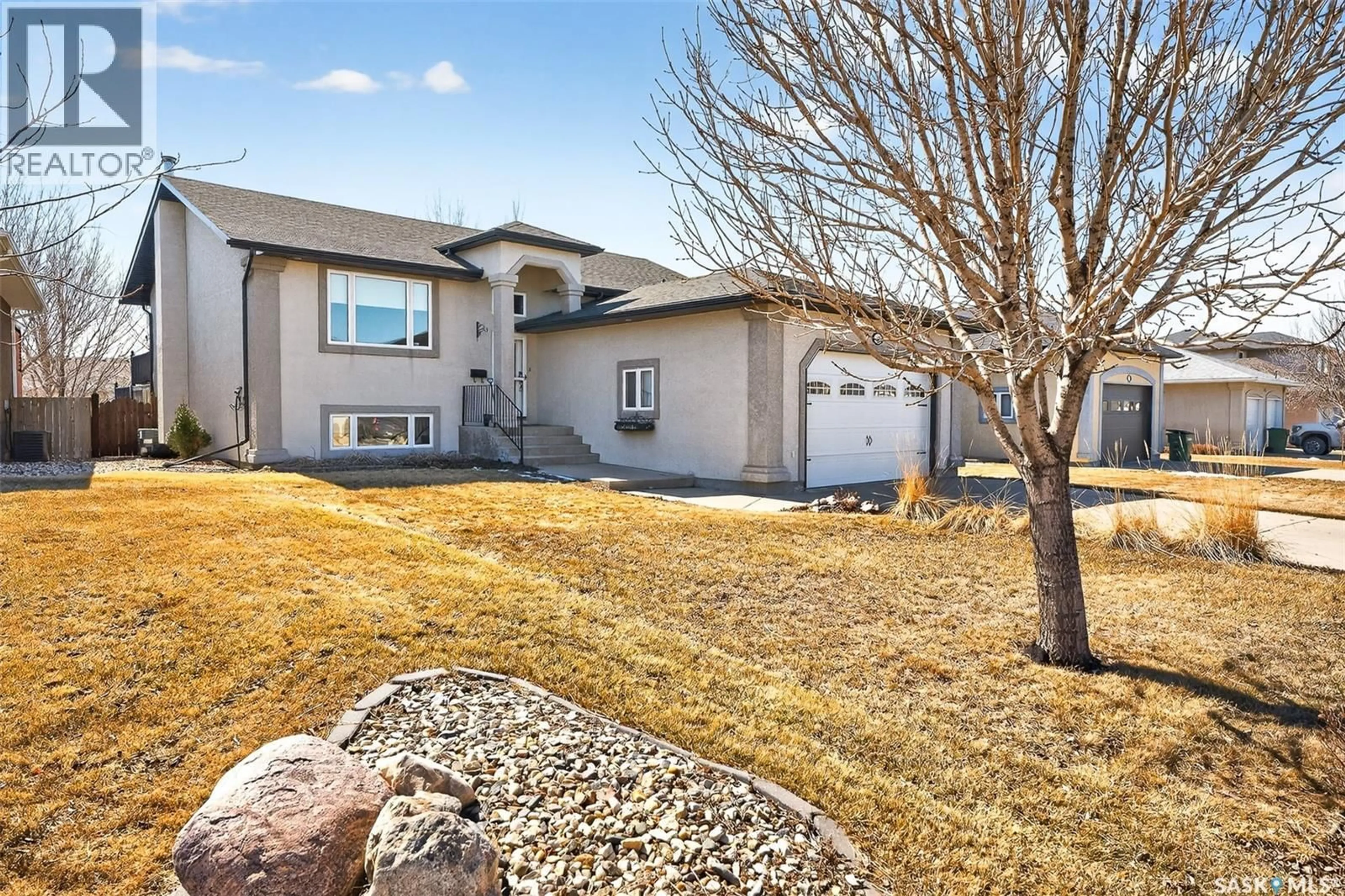 Home with vinyl exterior material, street for 45 GOLDENGLOW DRIVE, Moose Jaw Saskatchewan S6J1N7