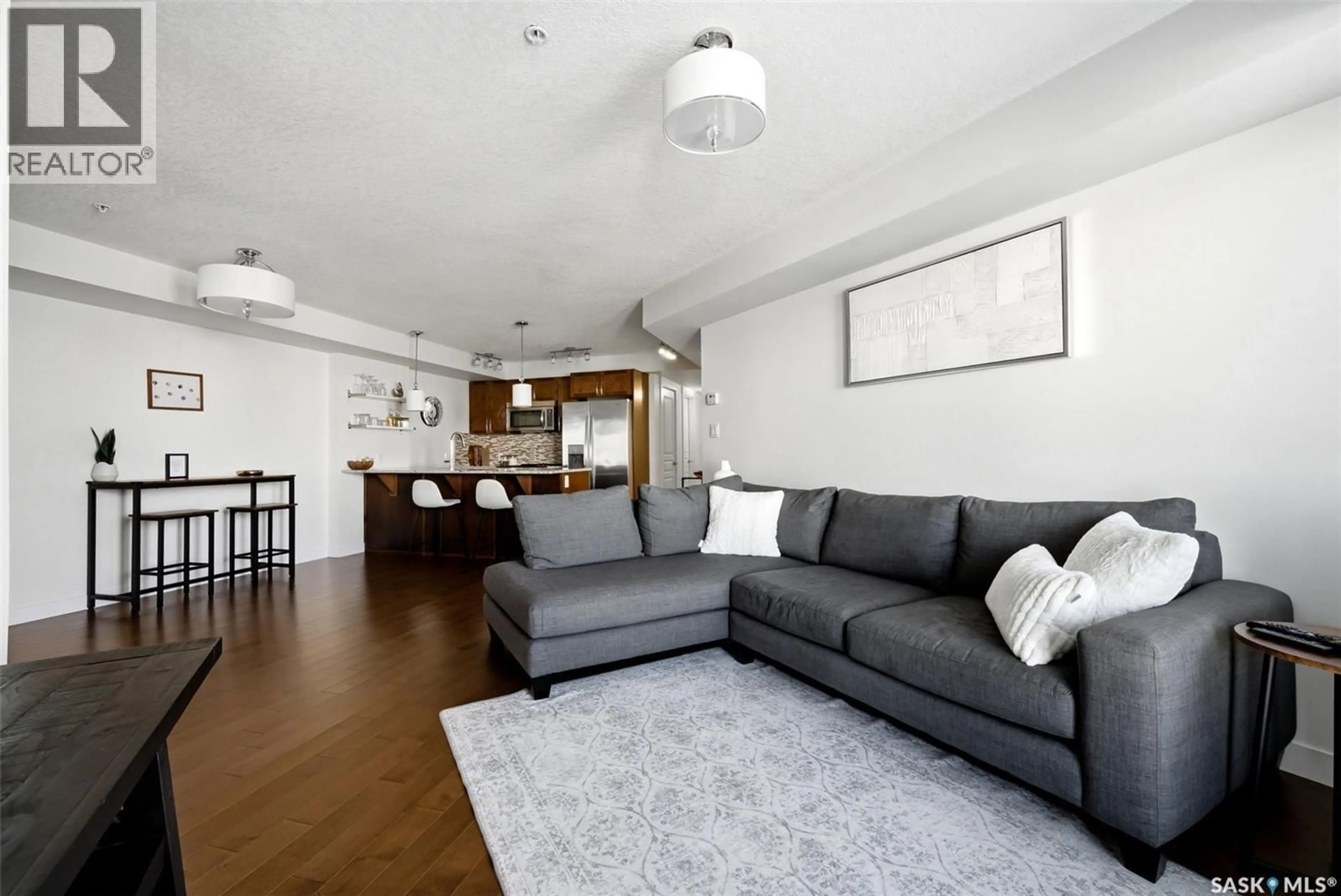 Living room with furniture, unknown for 5301 - 312 UNIVERSAL CRESCENT, Regina Saskatchewan S4W0L2