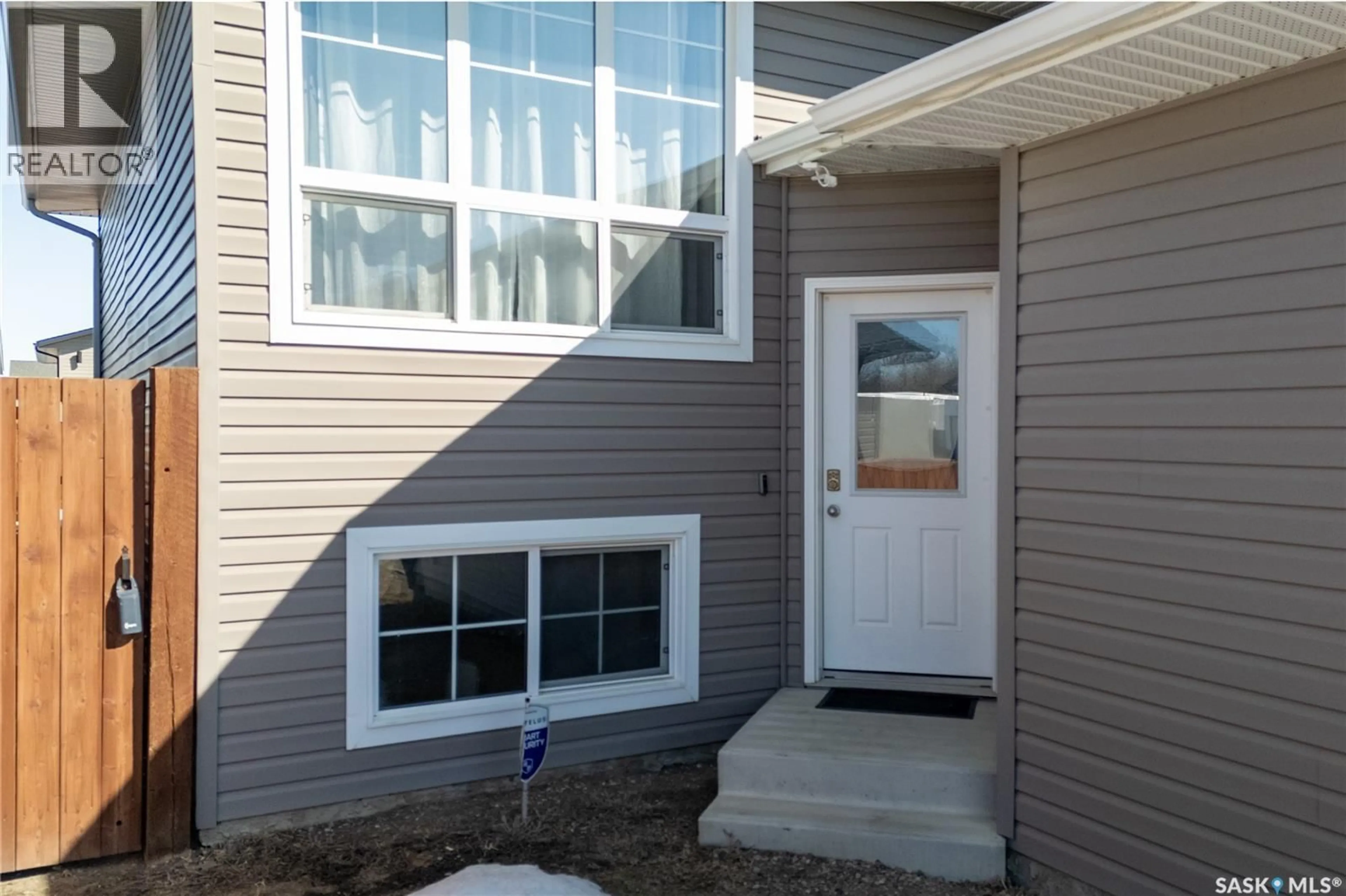 Home with vinyl exterior material, street for 314 REDDEKOPP CRESCENT, Warman Saskatchewan S0K4S3