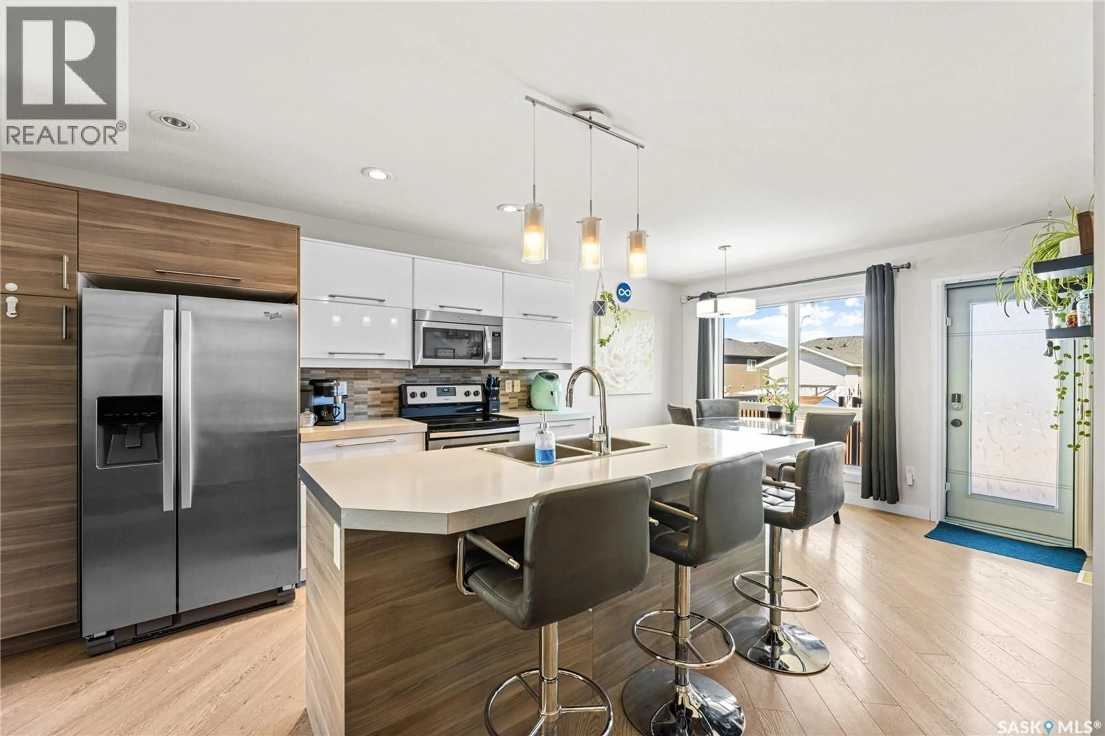 Open concept kitchen, unknown for 314 REDDEKOPP CRESCENT, Warman Saskatchewan S0K4S3