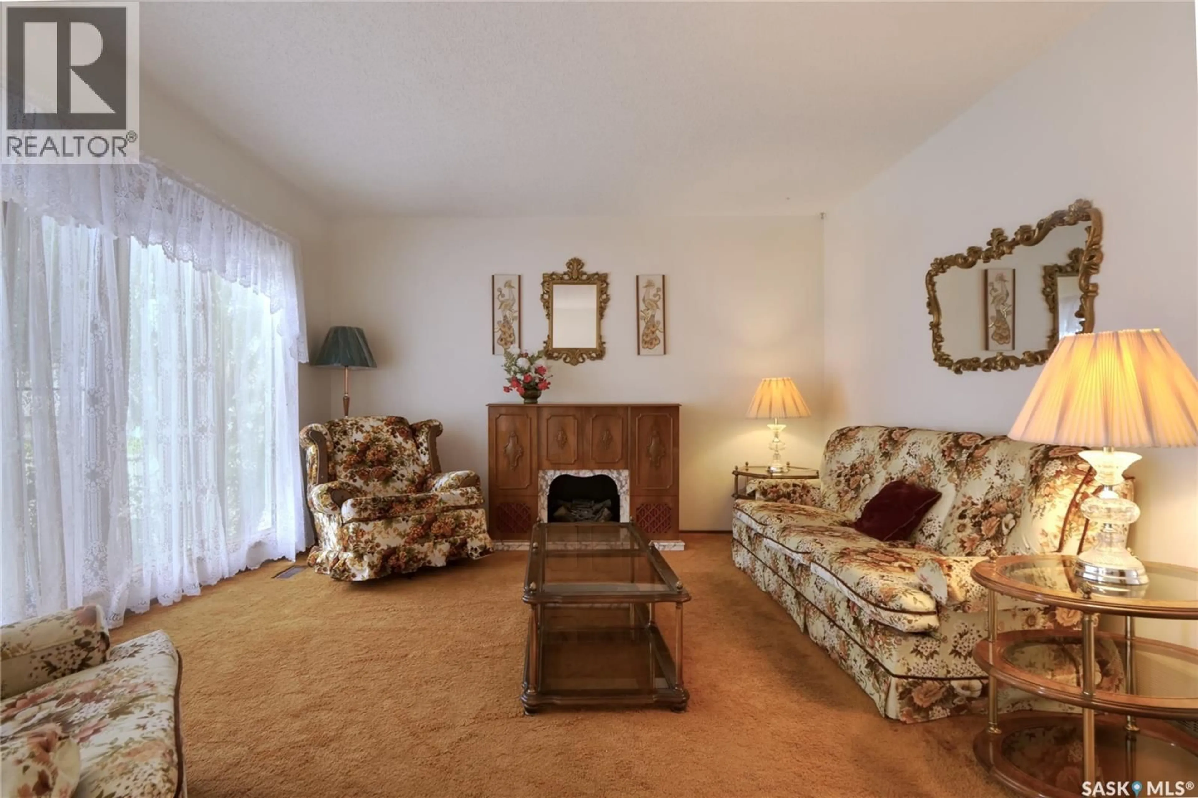 Living room with furniture, carpet floor for 1008 PARKLANE DRIVE, Assiniboia Saskatchewan S0H0B0